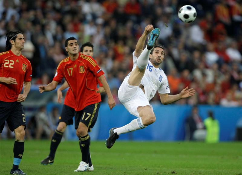 Sotirios "Sotiris" Kyrgiakos volleys against Spain.