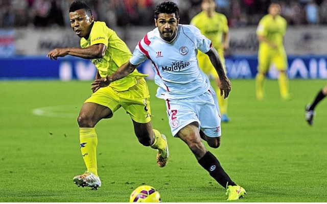 Benoit Tremoulinas of Sevilla dribbling