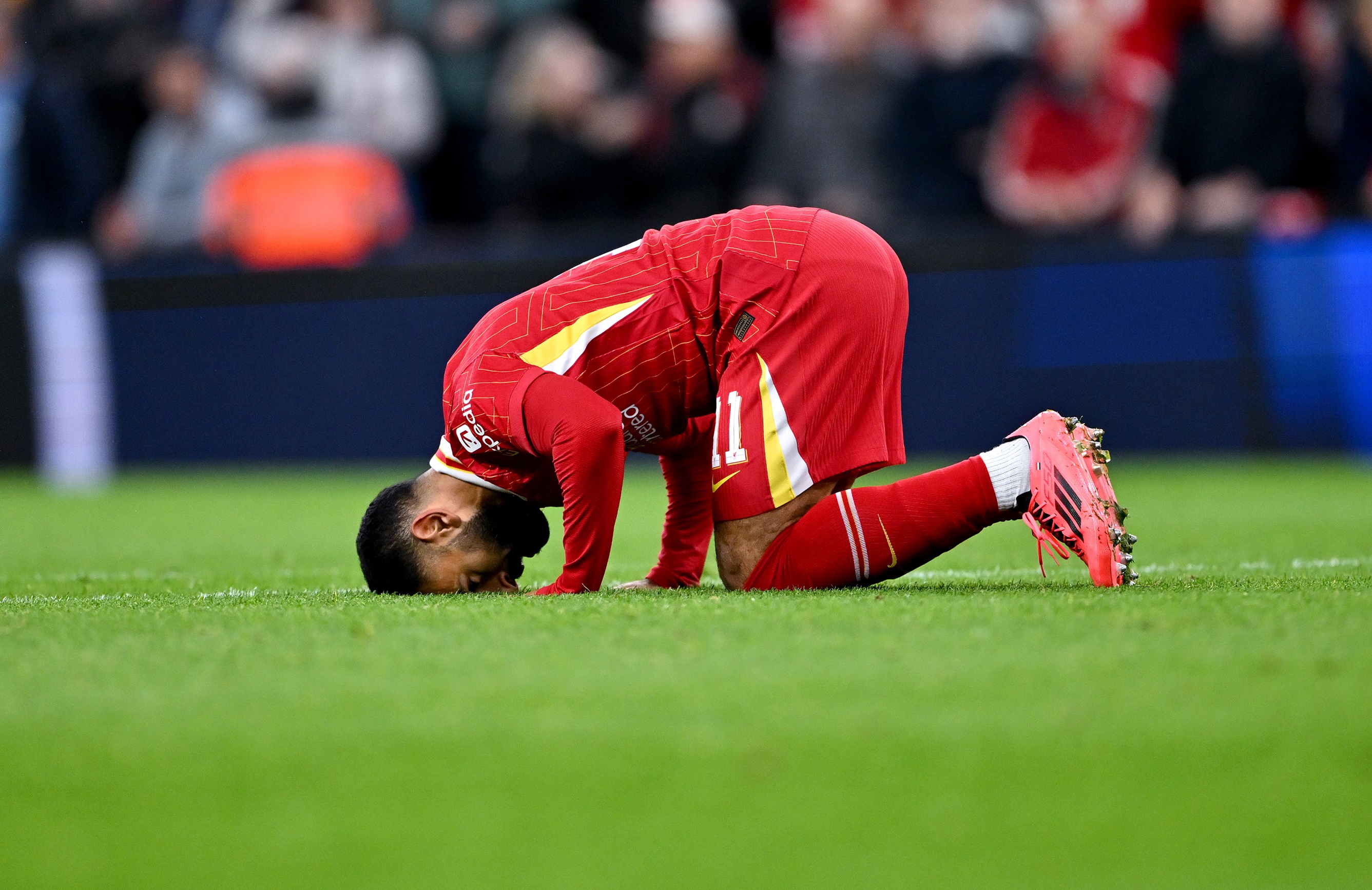 Salah, Van Dijk, Trent, Slot Mo Salah (whose contract expires in 2025) celebrates after scoring Liverpool's third goal against West Ham United