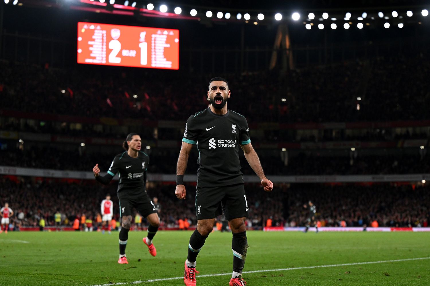 Salah celebrates scoring against Arsenal
