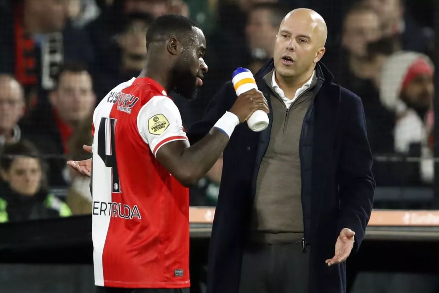 Arne Slot and Lutsharel Geertruida at Feyenoord