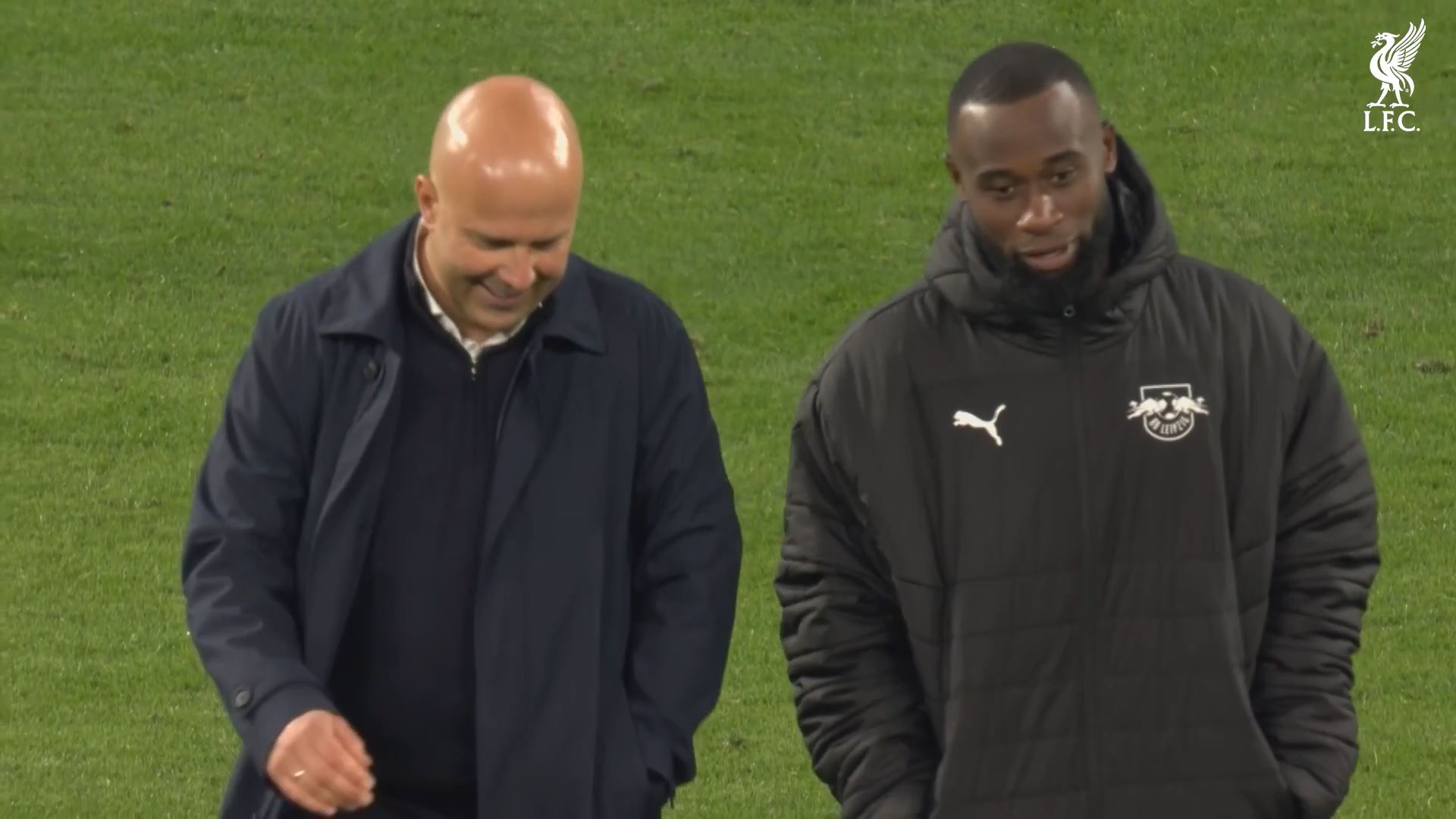 Arne Slot and Lutsharel Geertruida after Liverpool beat RB Leipzig