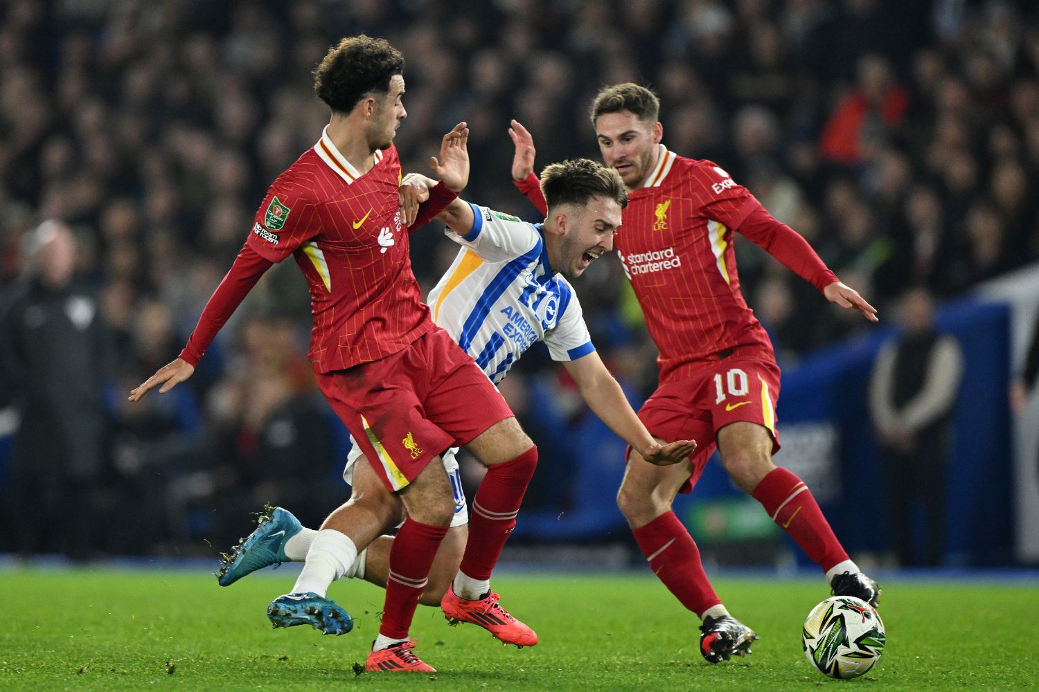 Alexis Mac Allister and Curtis Jones in action against Brighton