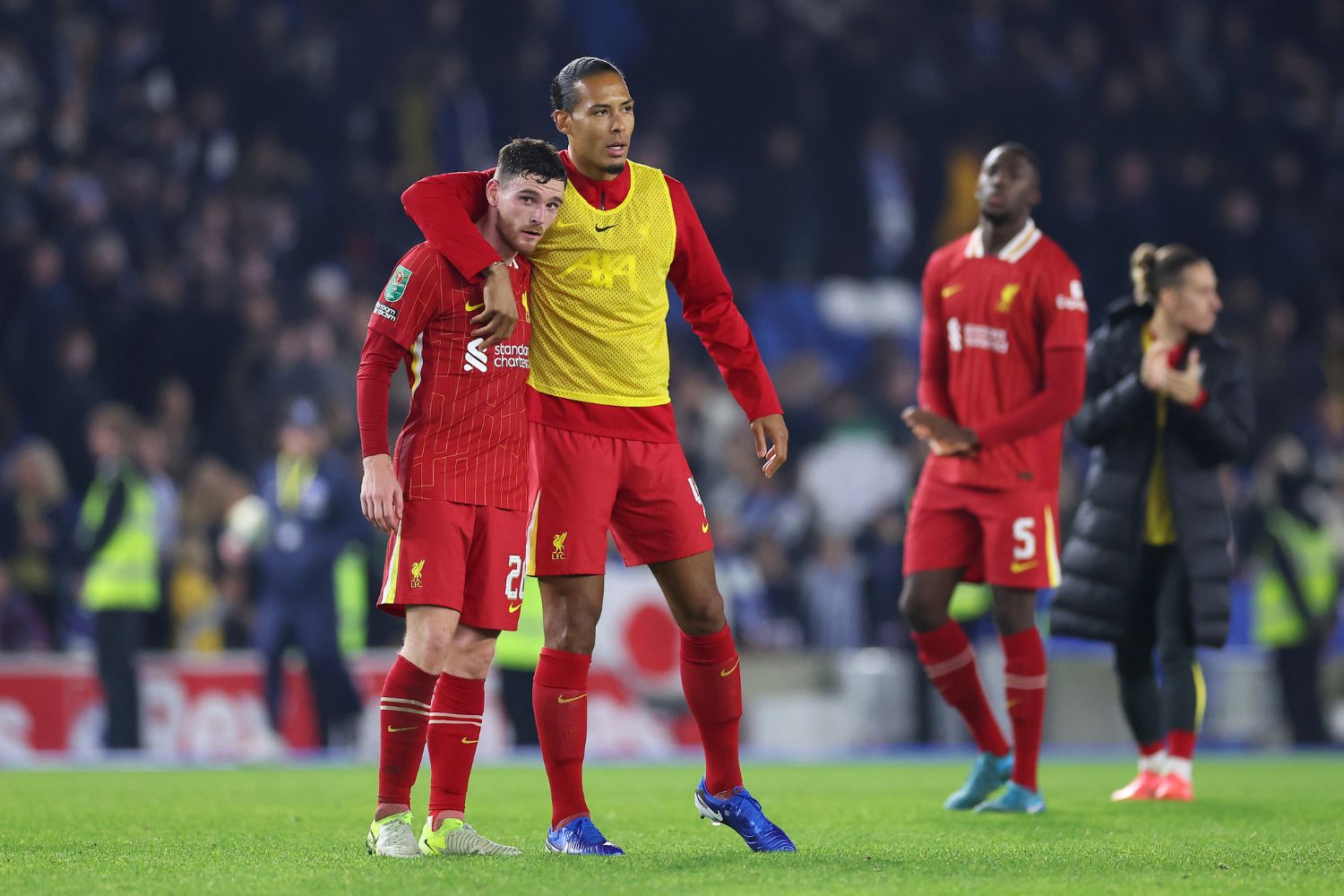 Virgil van Dijk with Andy Robertson after Brighton