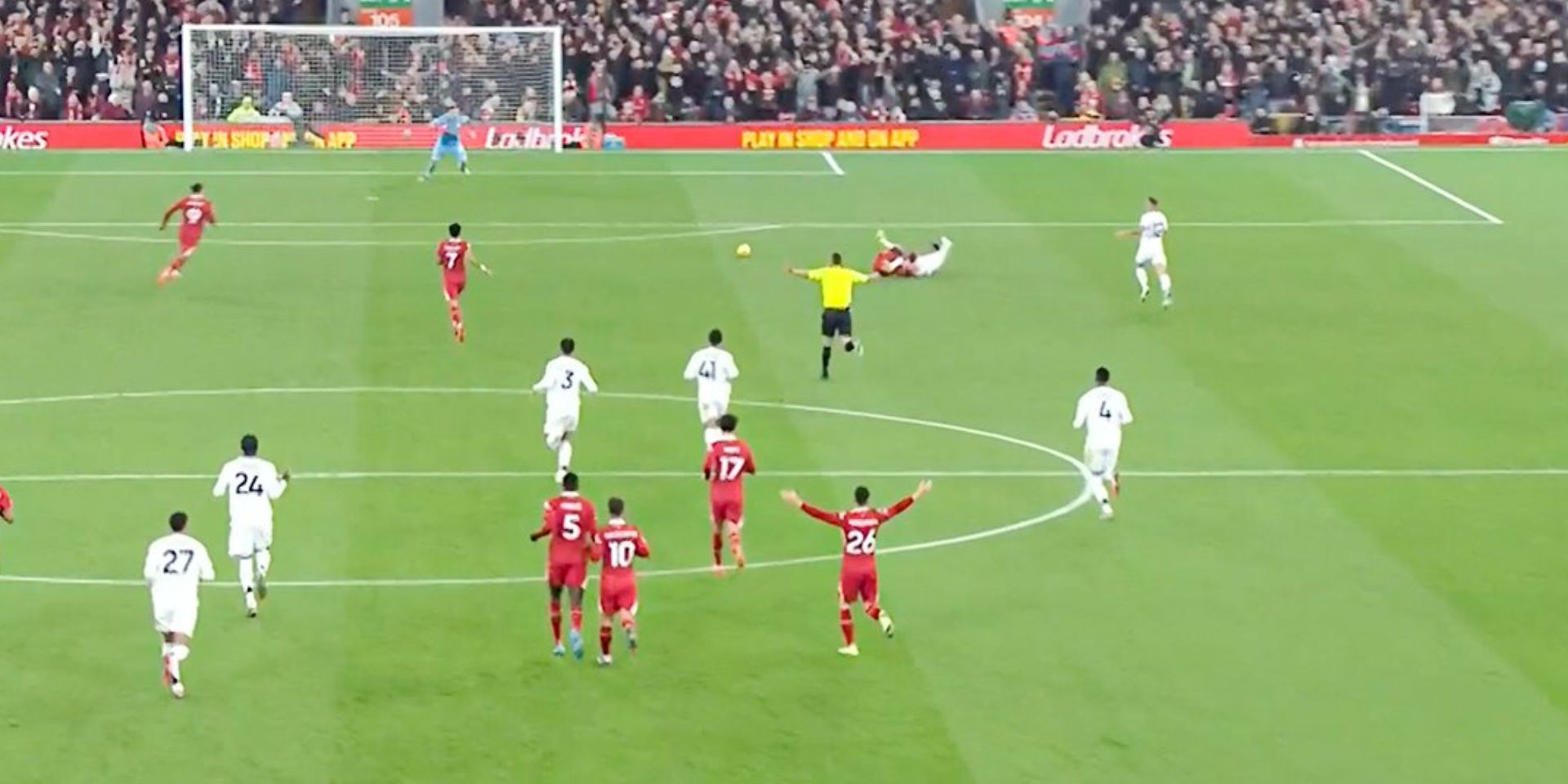 David Coote waves play on after Salah is fouled