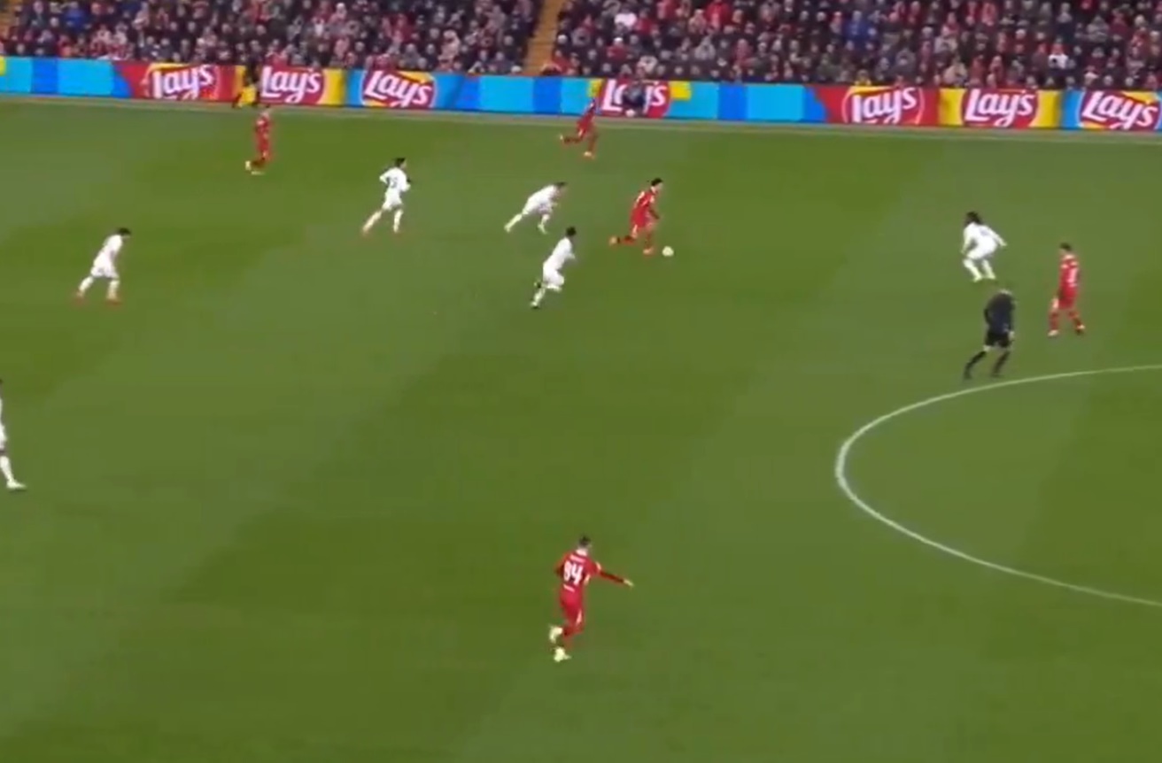 Curtis Jones peels away from Jude Bellingham and Luka Modric