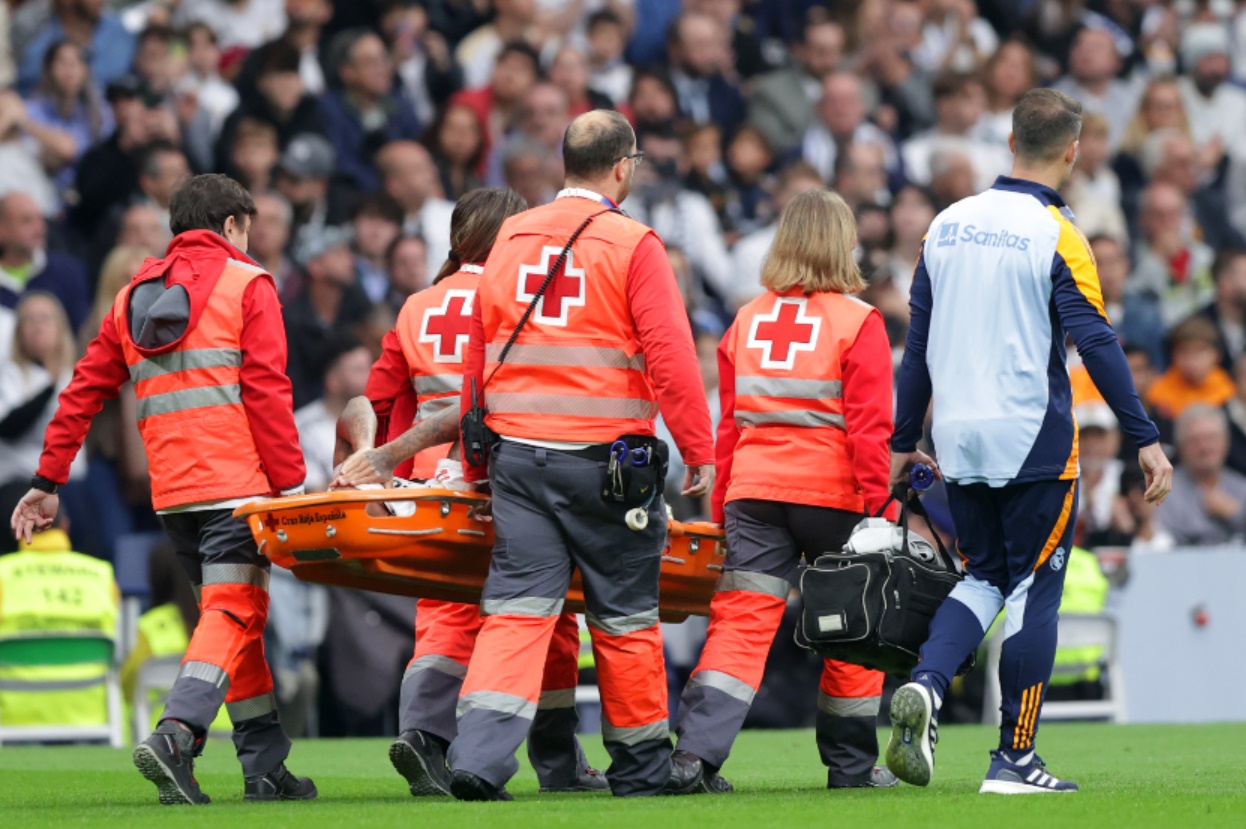 Eder Militao is stretchered off with an ACL injury