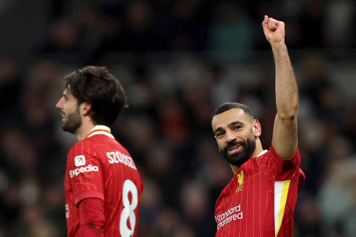 Mo Salah celebrates scoring against Spurs