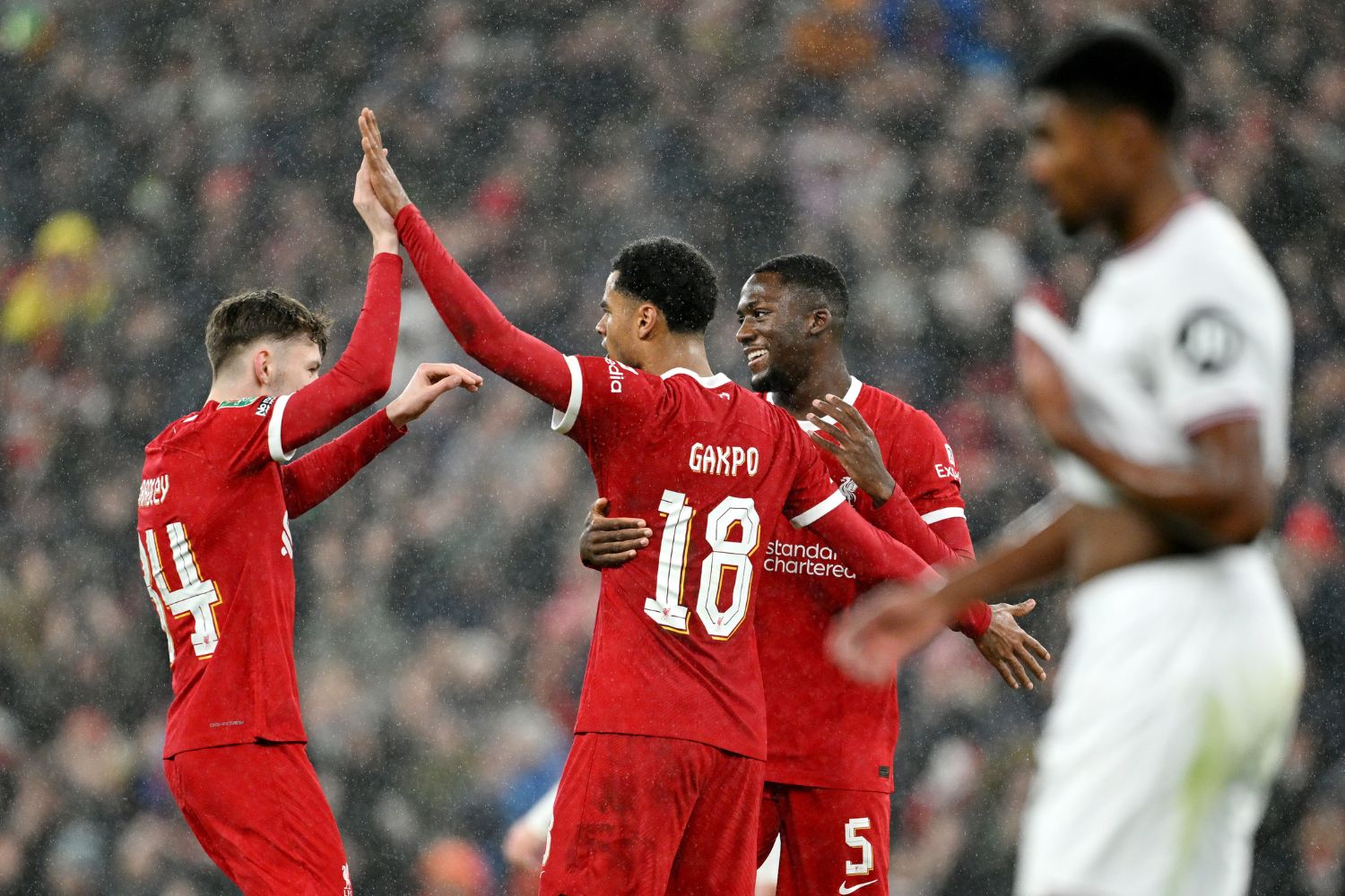 Ibou Konate and Conor Bradley celebrate together