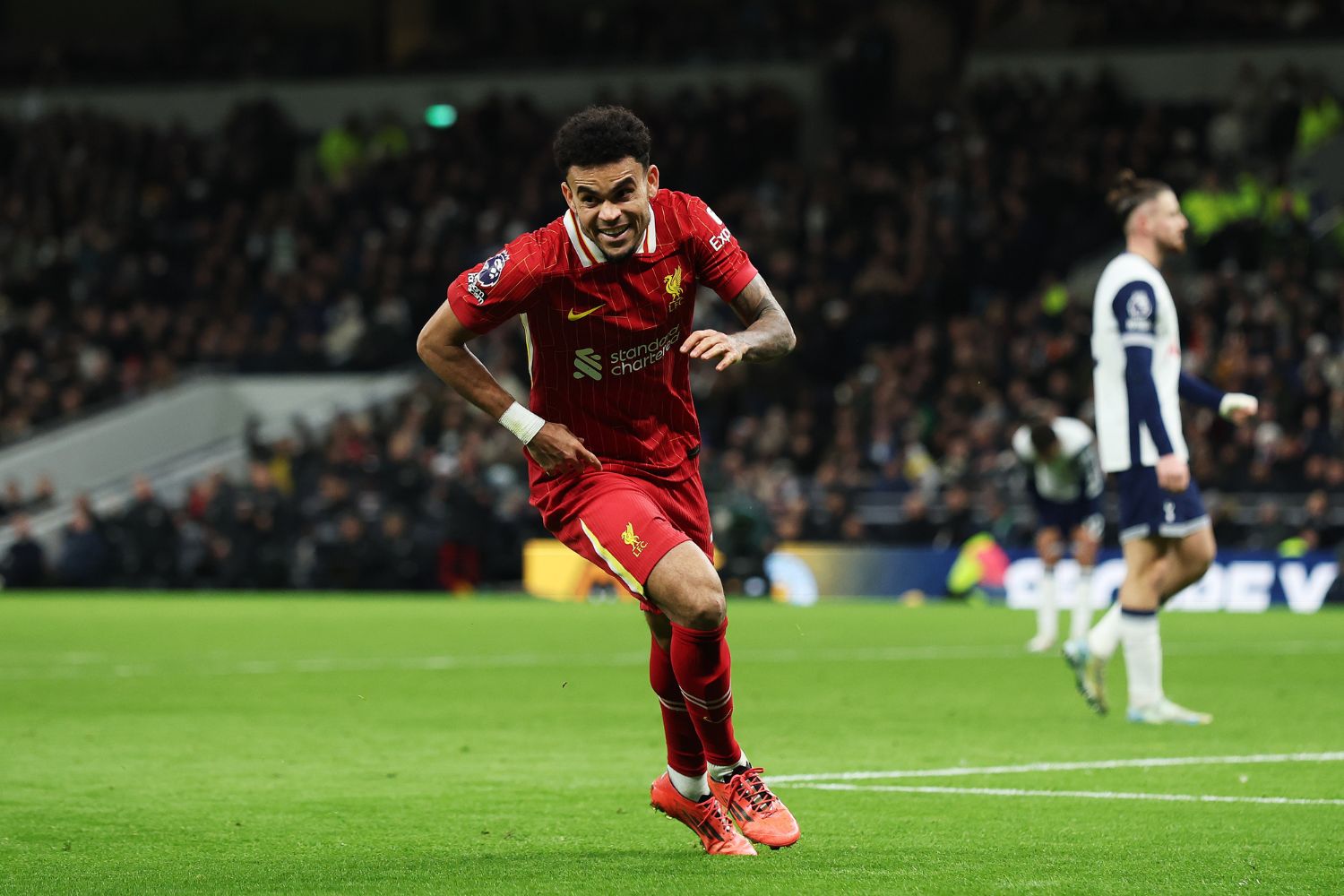Luis Diaz celebrates scoring against Tottenham