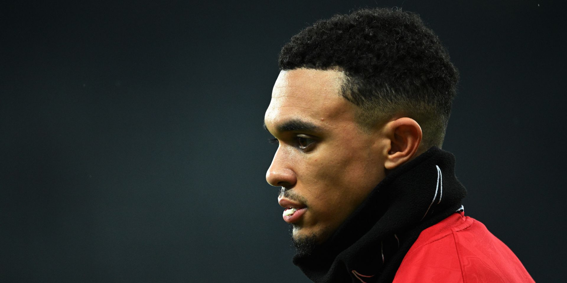 Trent Alexander-Arnold warms up for Liverpool