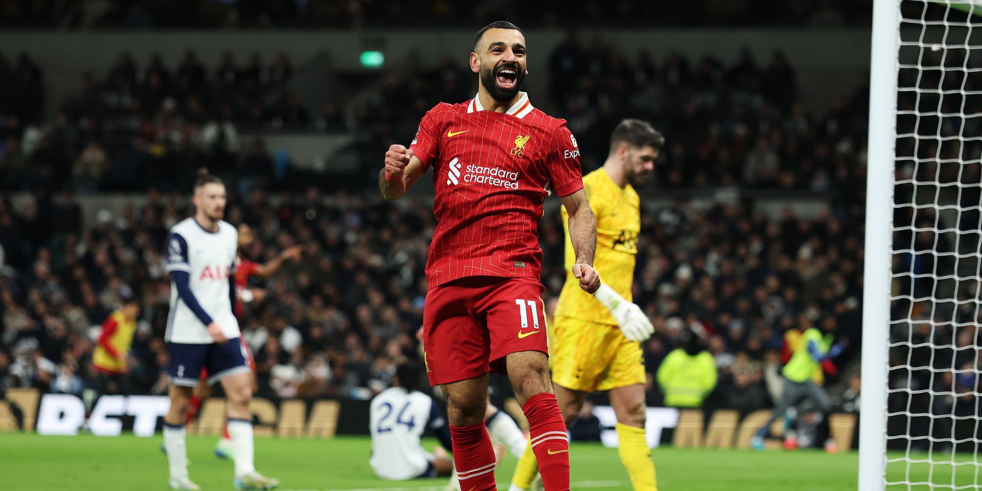 Mo Salah celebrates after scoring against Spurs