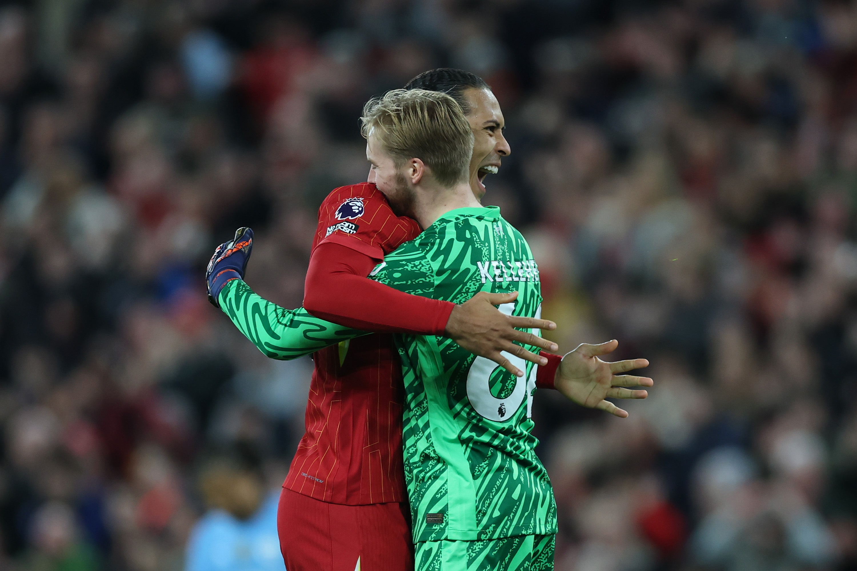 Virgil van Dijk and Caoimhin Kelleher celebrate Liverpool's win over Man City.