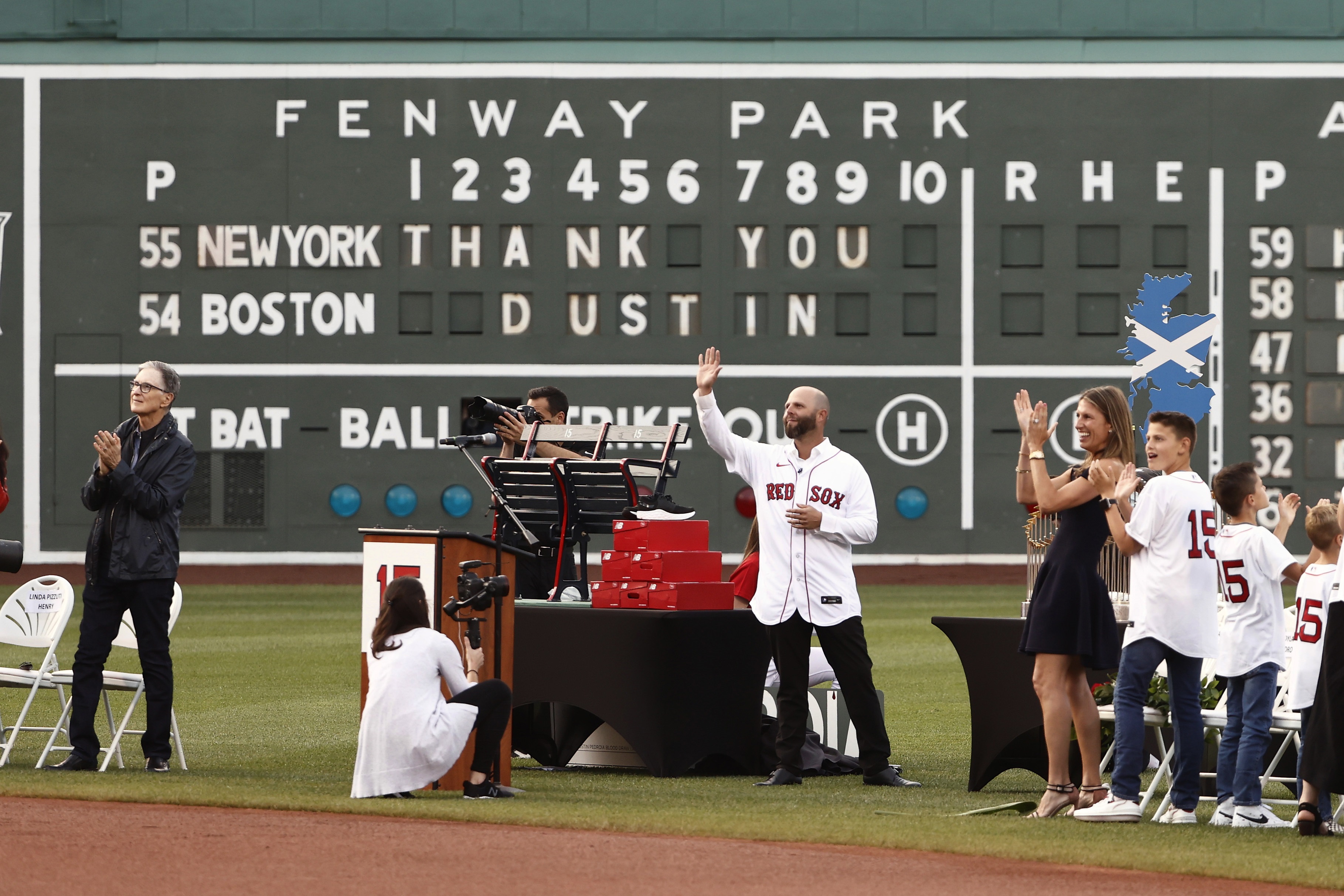 Red Sox and principal Liverpool owner John W Henry with retired Boston Red Sox second baseman Dustin Pedroia.