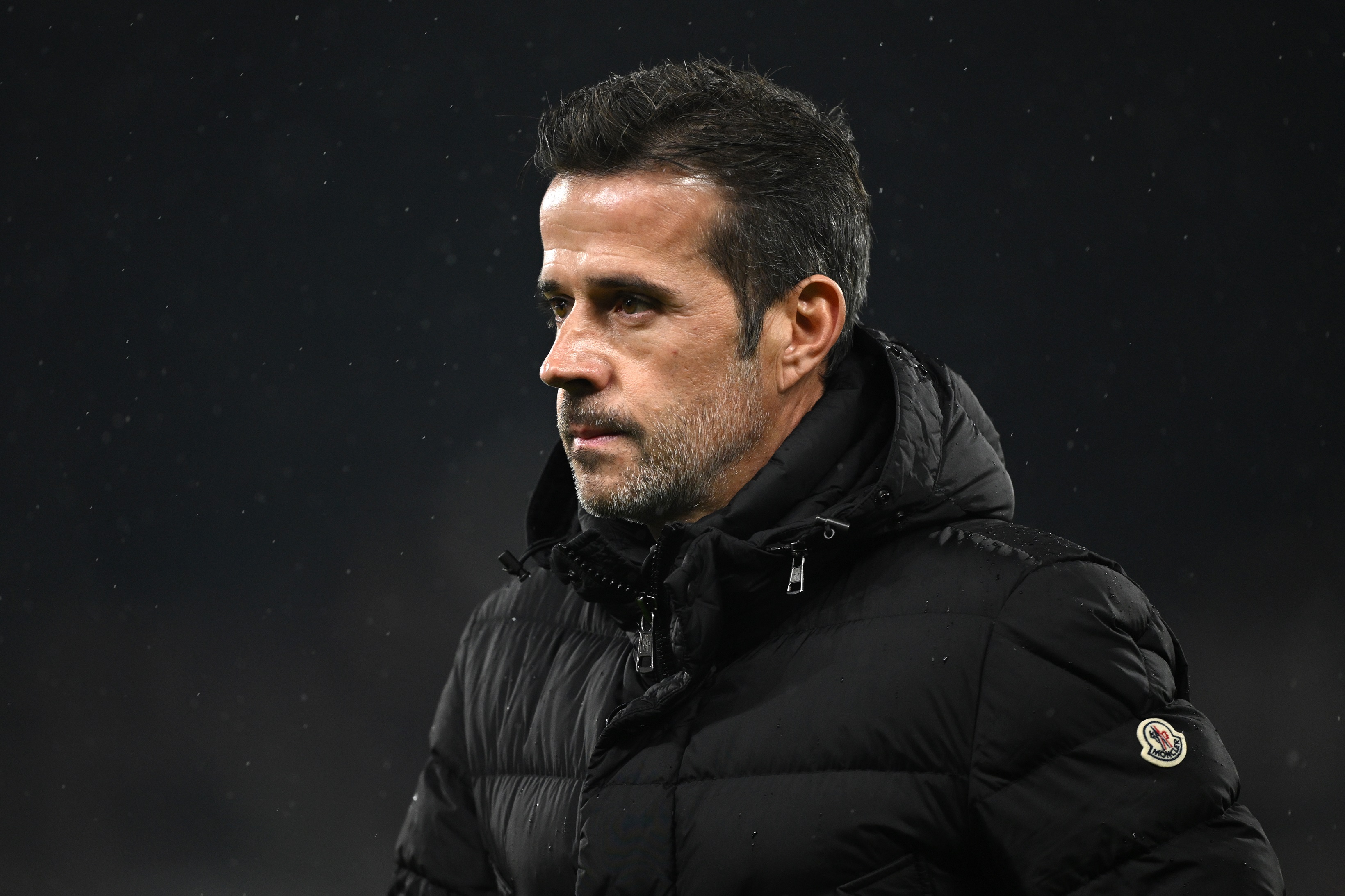 Marco Silva looks on during a Premier League match.