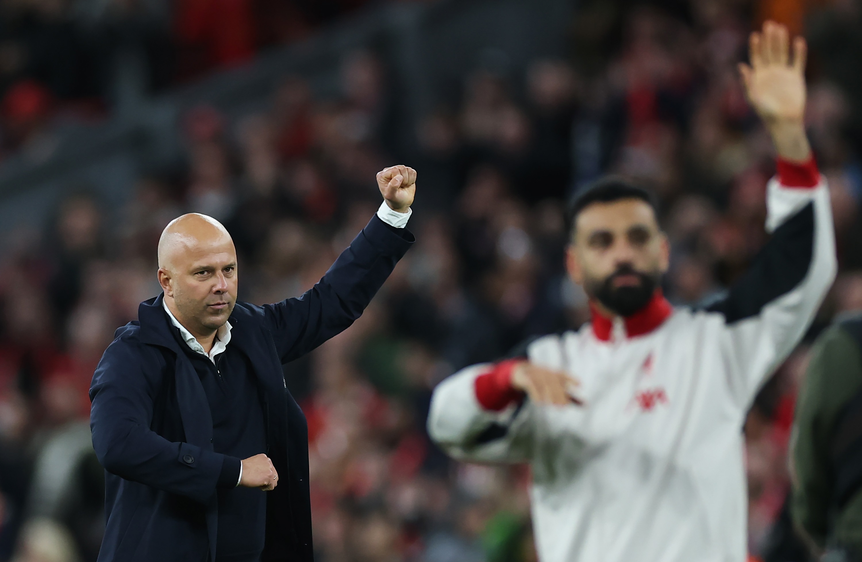 Arne Slot celebrates Liverpool's 2-0 win over Man City.