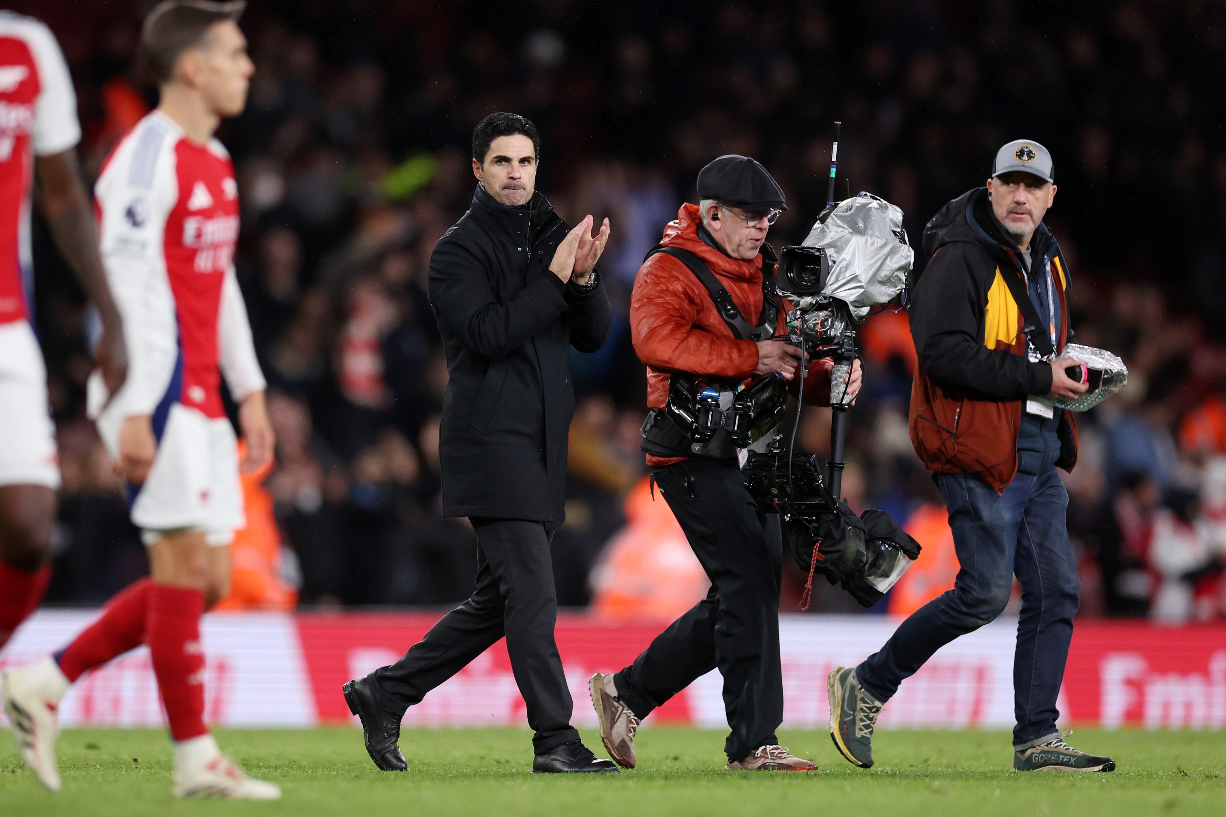Mikel Arteta applauds the fans at the Emirates Stadium.