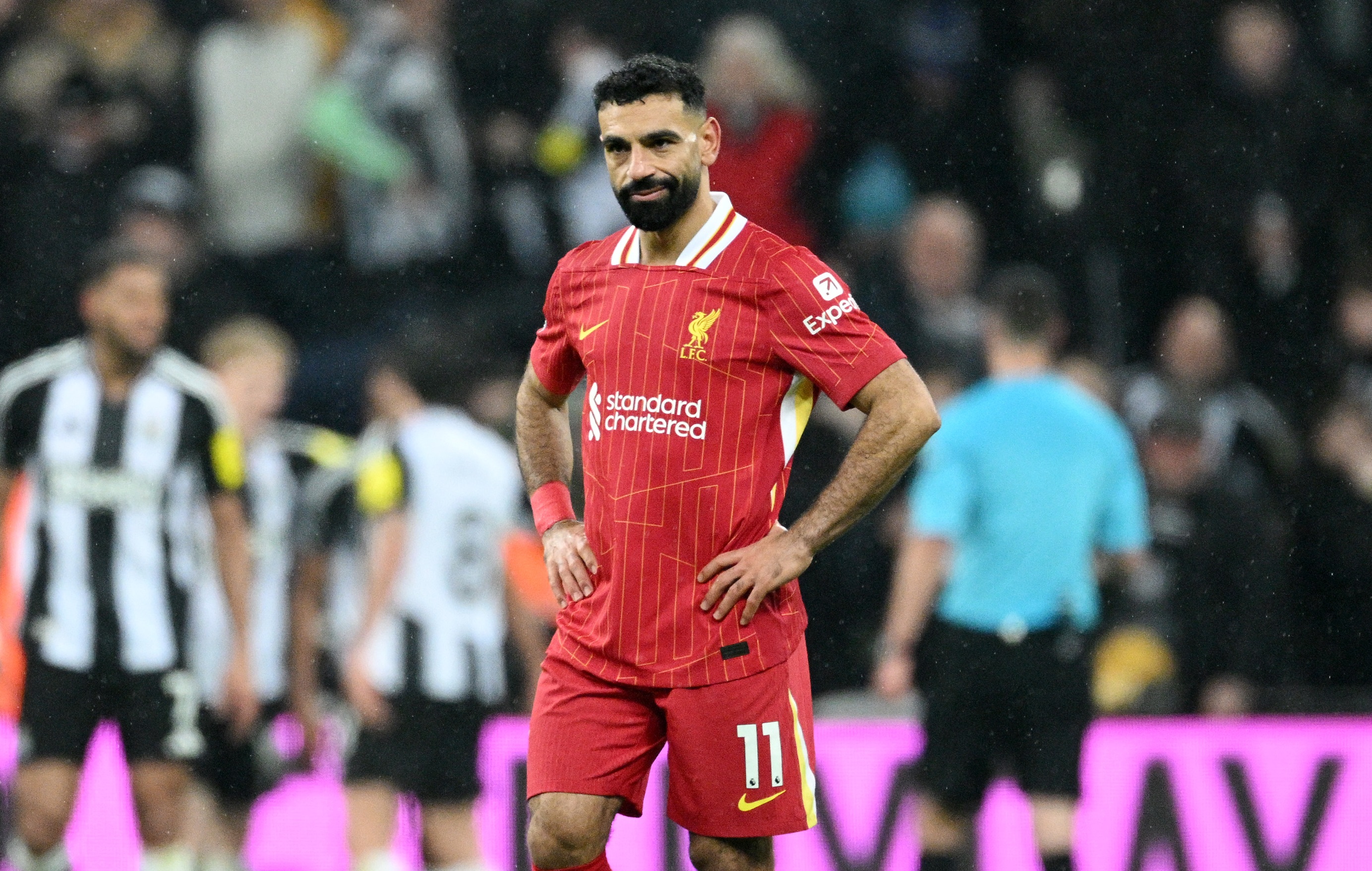 Mo Salah stands with hands on hips during Newcastle draw.