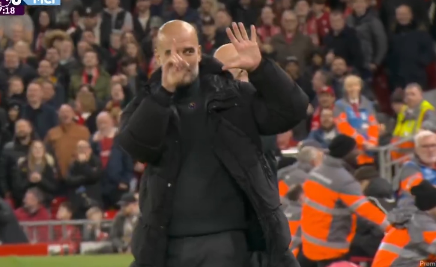 Pep Guardiola makes gesture to Liverpool fans during Man City loss.