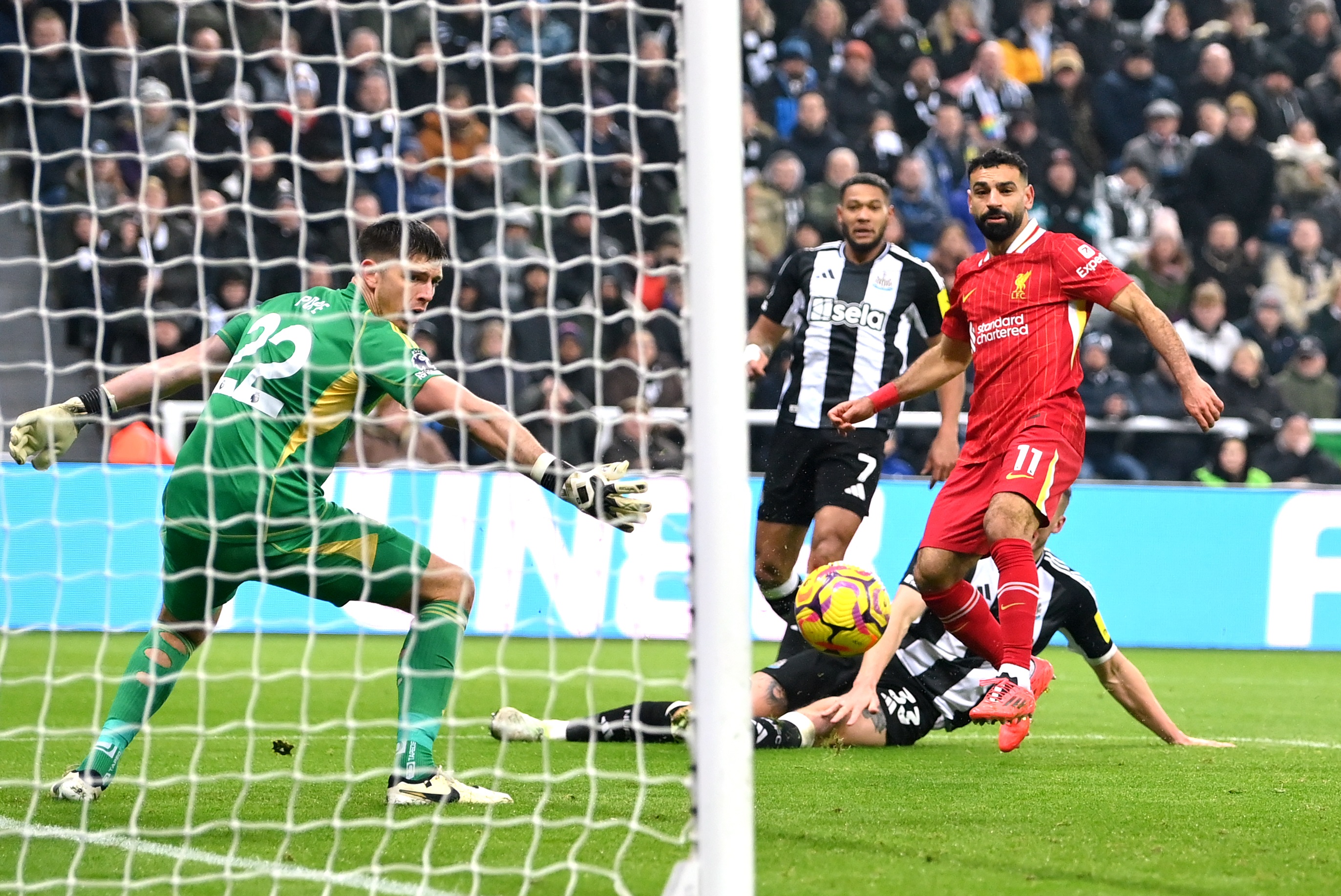 Mo Salah scores against Newcastle United at St James' Park.