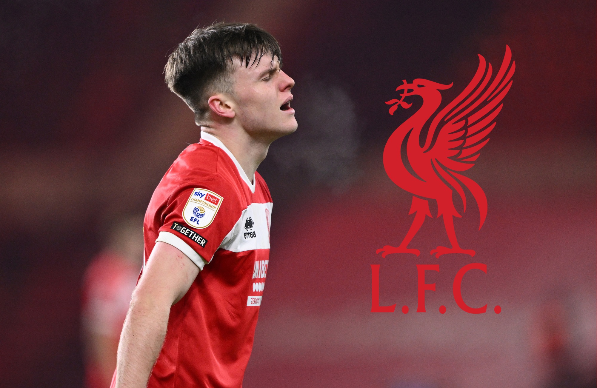 Ben Doak looks frustrated next to Liverpool club crest.