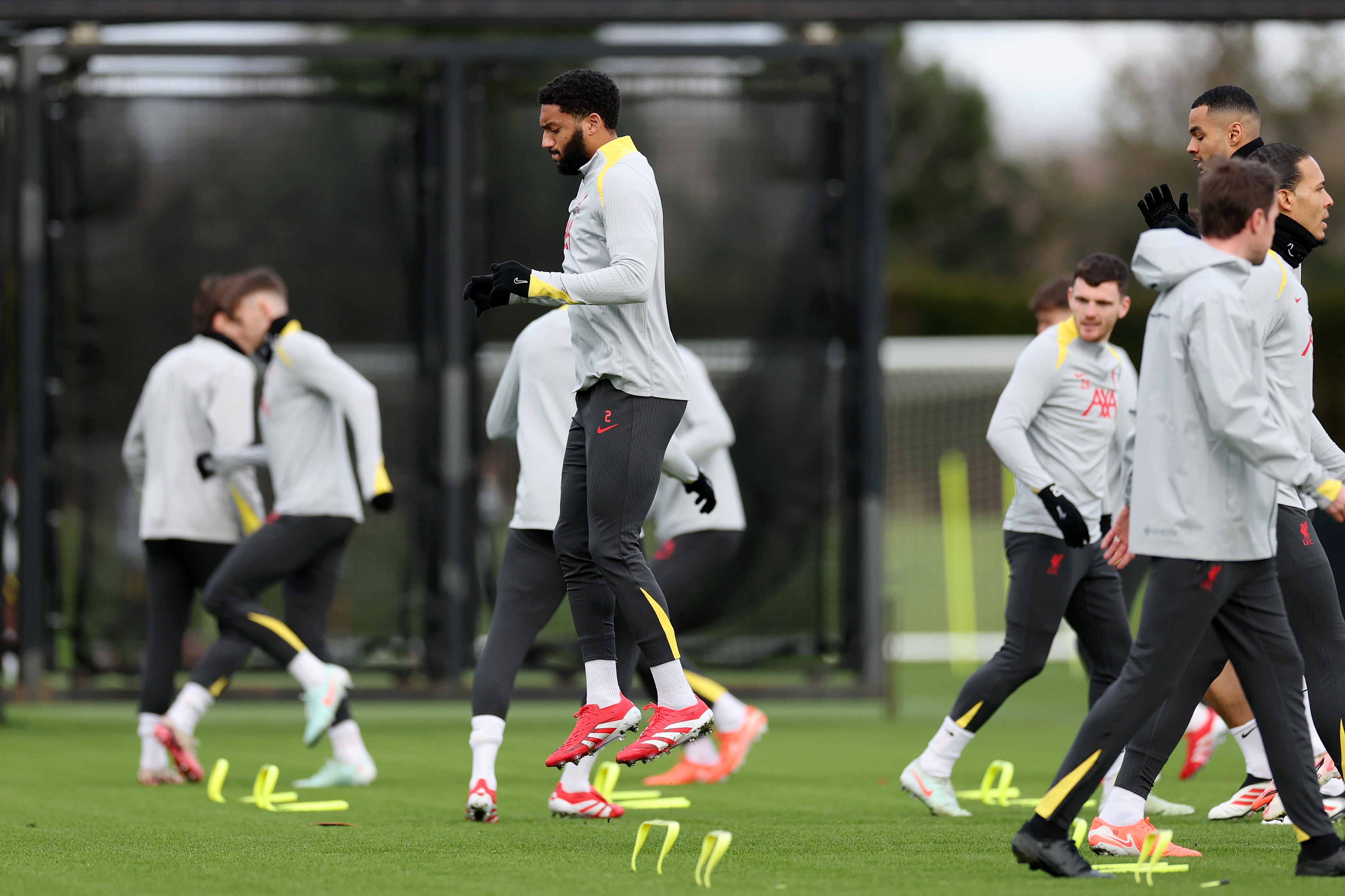 Joe Gomez jumps during a Liverpool training session.