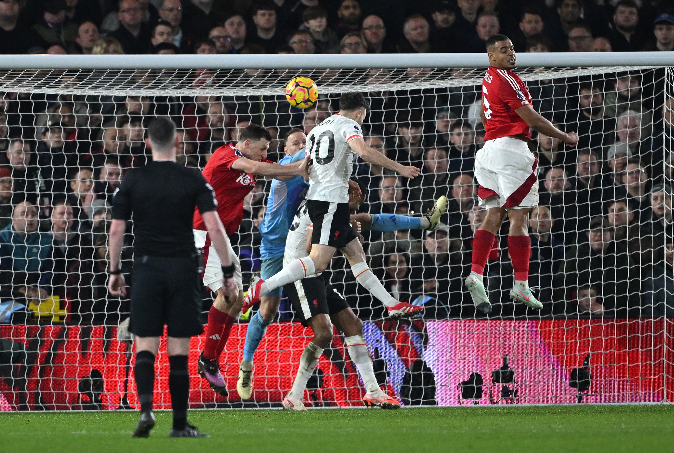 Diogo Jota scores a header from a corner at the City Ground.