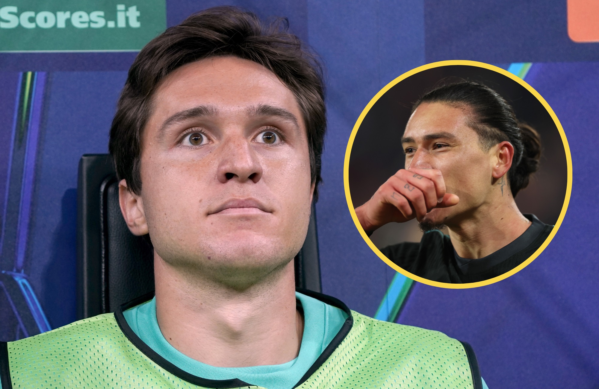 Federico Chiesa looks on from the subs bench next to picture of Darwin Nunez.