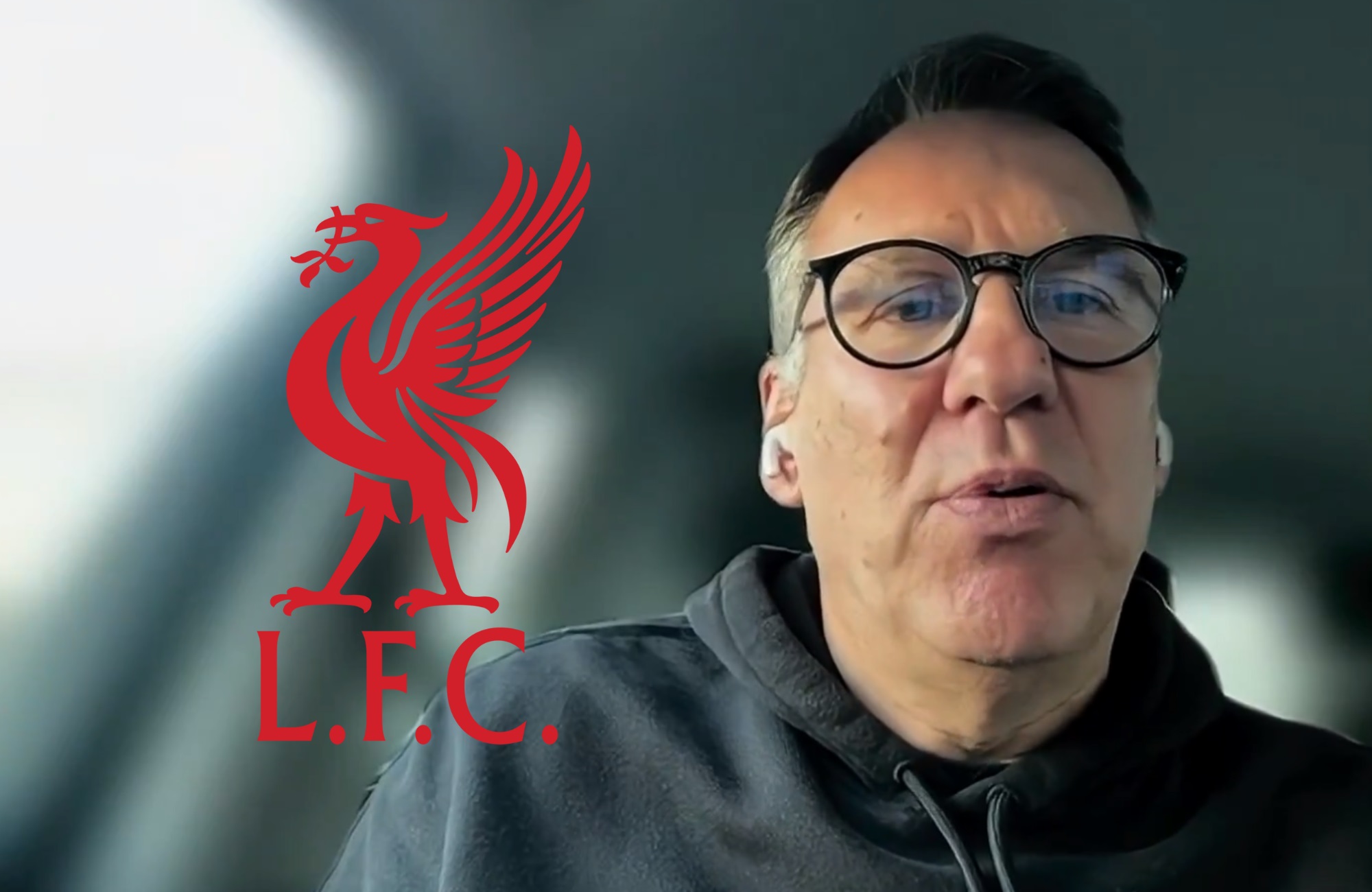 Paul Merson speaks to Sky Sports studio next to the Liverpool club crest.