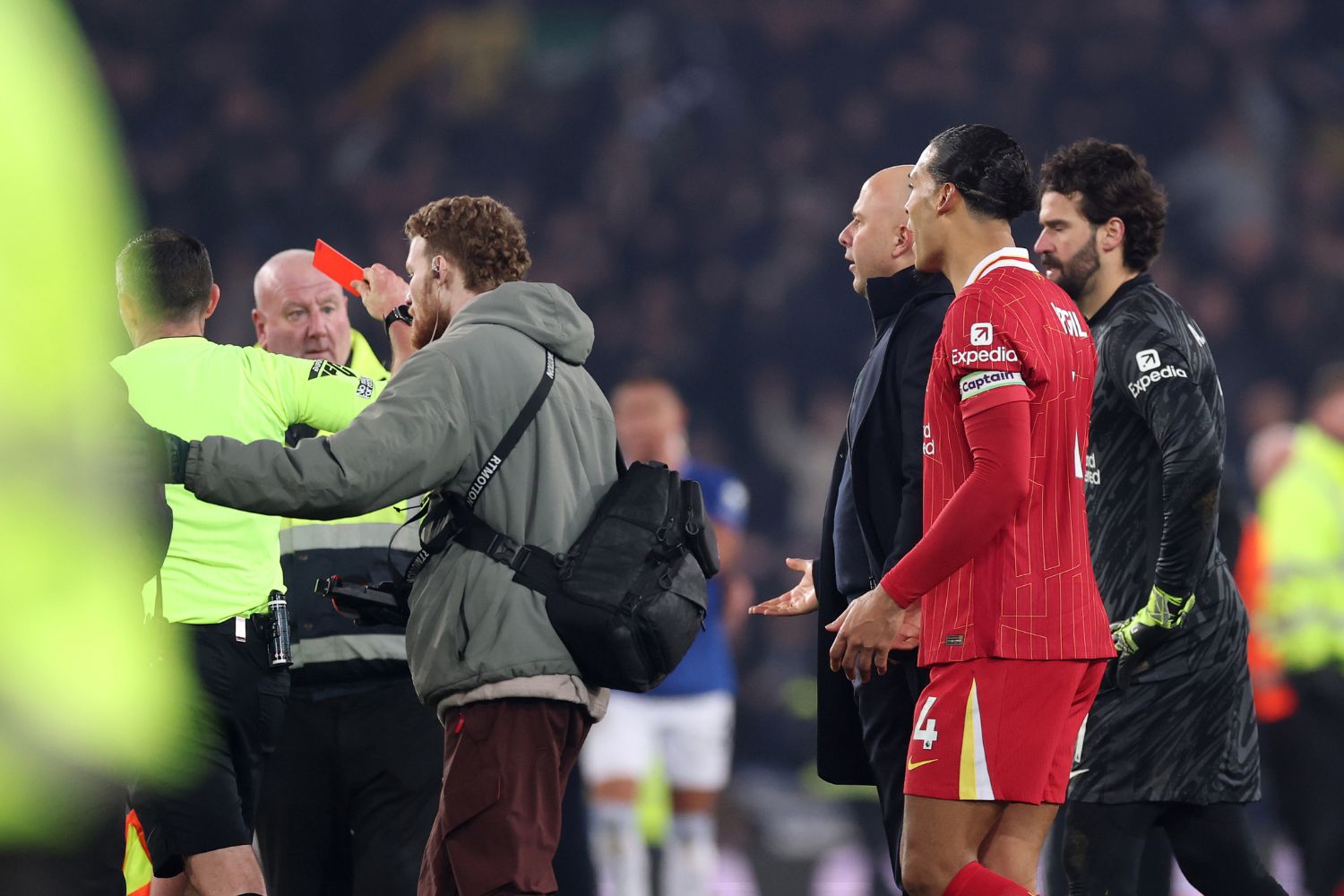 Arne Slot is shown a red card at Goodison Park by Michael Oliver