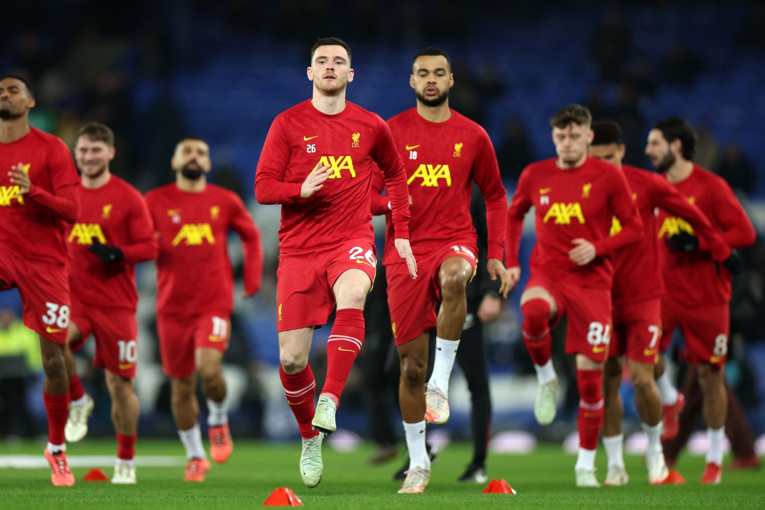 Cody Gakpo warms up ahead of the Merseyside derby
