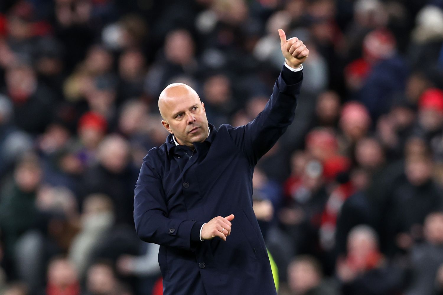 Arne Slot salutes the Kop at Anfield