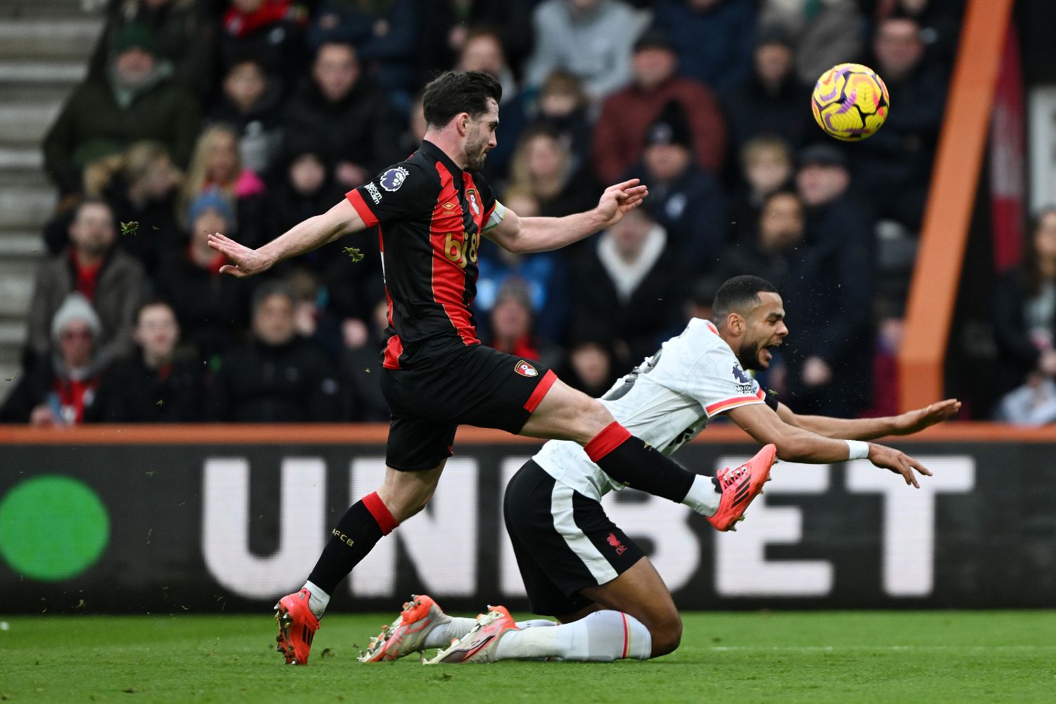 Lewis Cook fouls Cody Gakpo for the Liverpool penalty