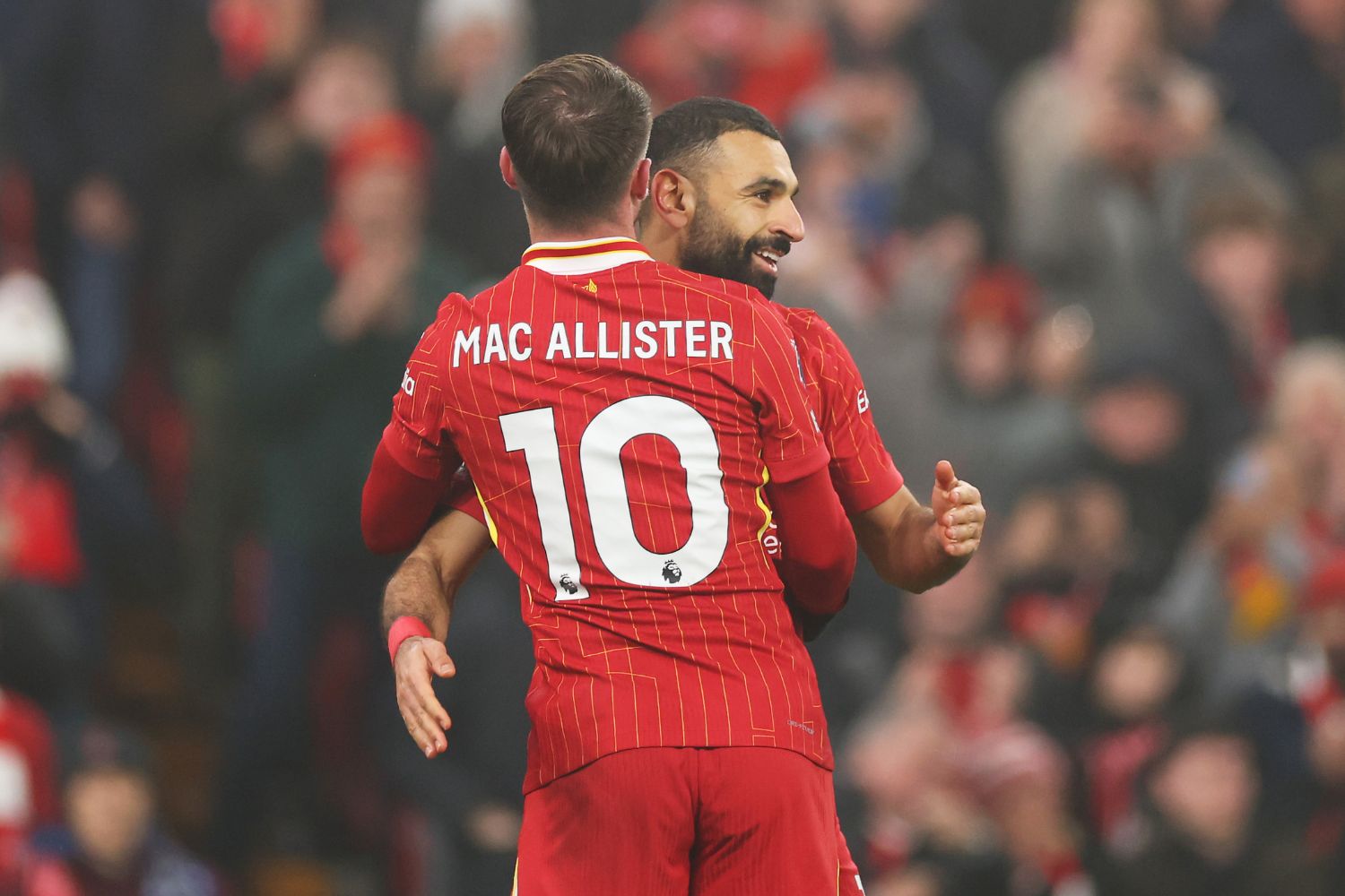 Alexis Mac Allister and Mo Salah celebrate for Liverpool