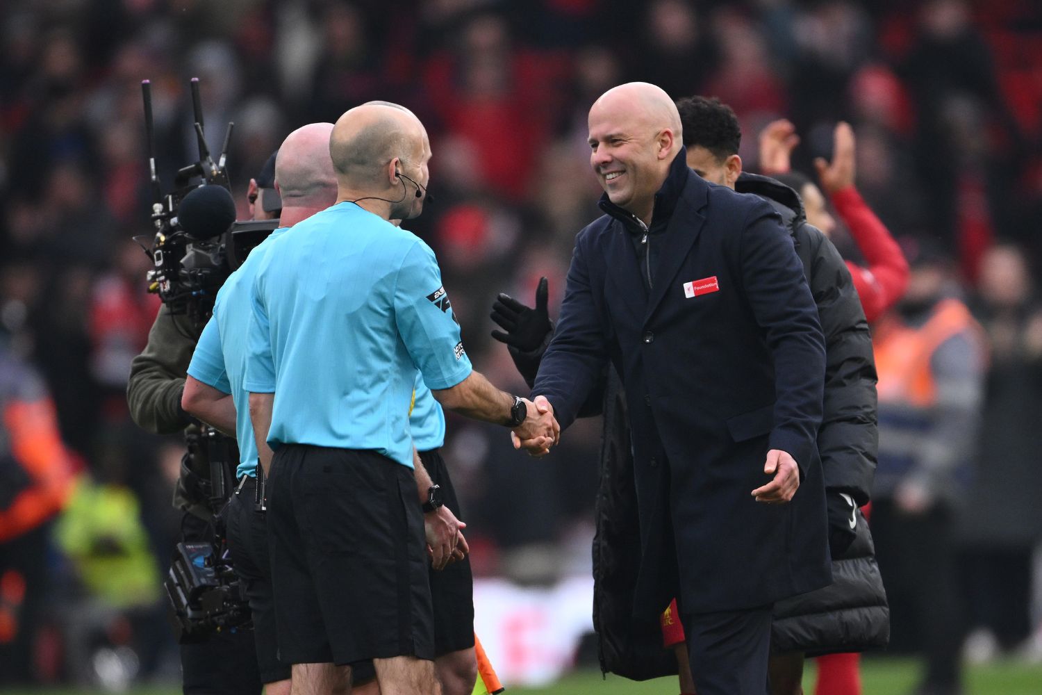 Arne Slot celebrates victory at Anfield