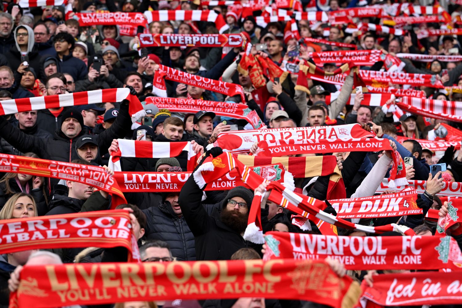 Liverpool fans at Anfield with scarves