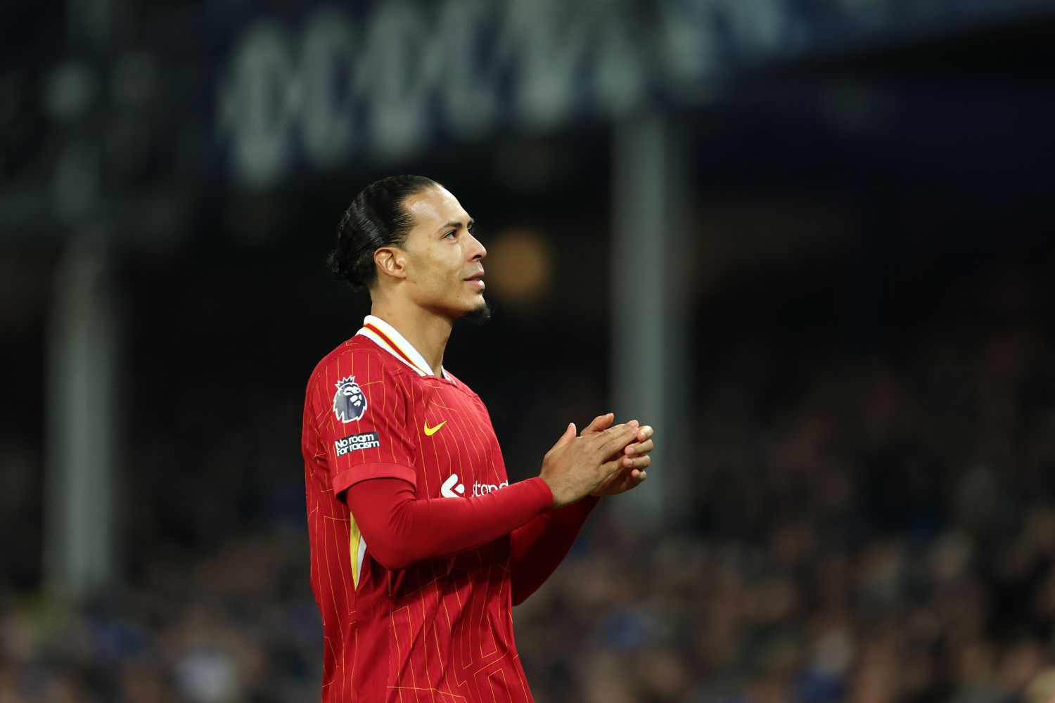 Virgil van Dijk applauds the Liverpool fans