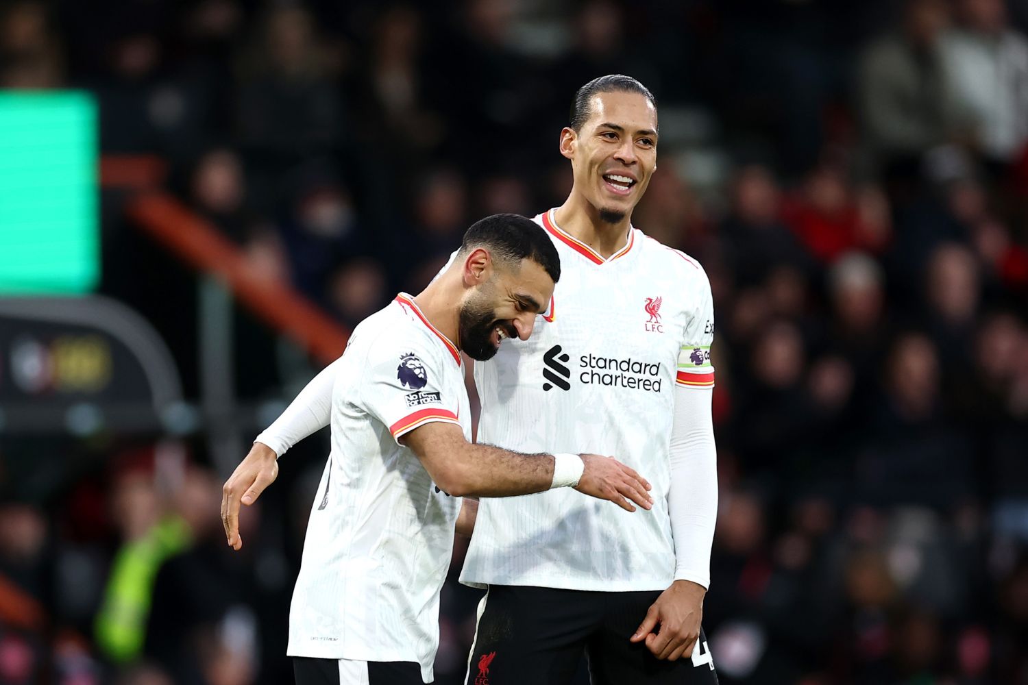 Virgil van Dijk and Mo Salah celebrate for Liverpool