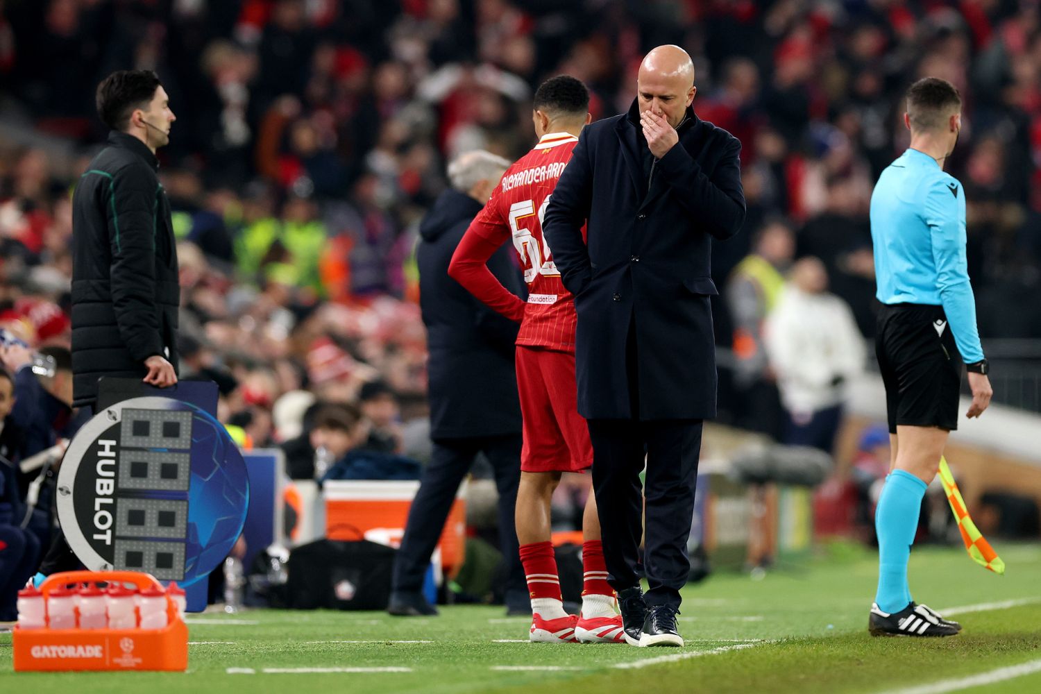 Arne Slot readys a Champions League substitution