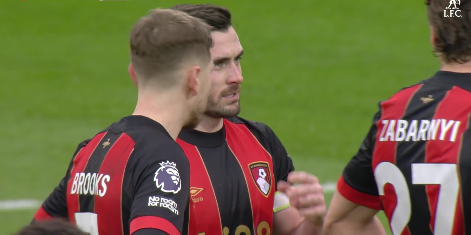 Lewis Cook speaks with teammates after Gakpo penalty