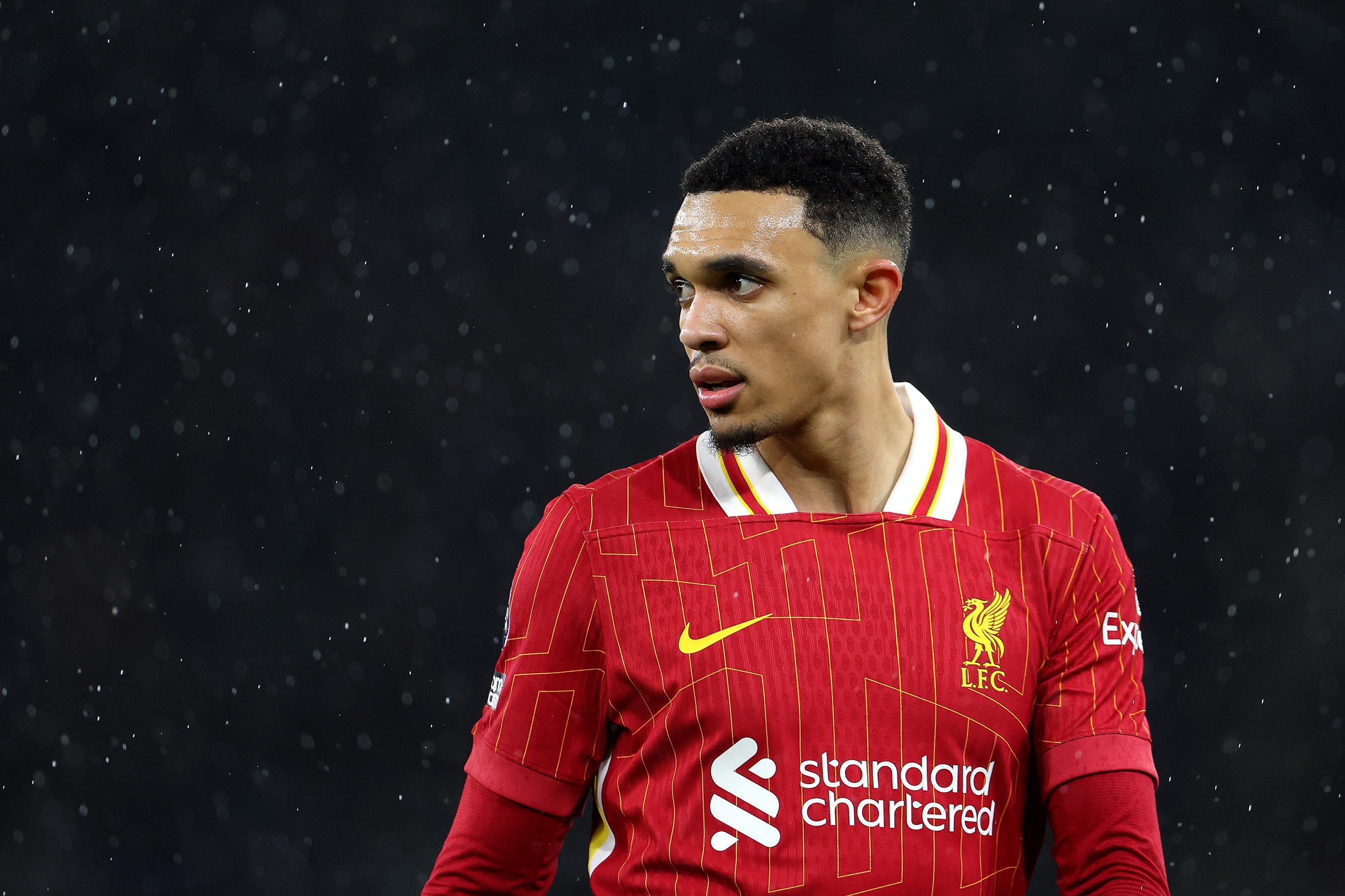 Trent Alexander-Arnold looks past his shoulder at the Etihad.