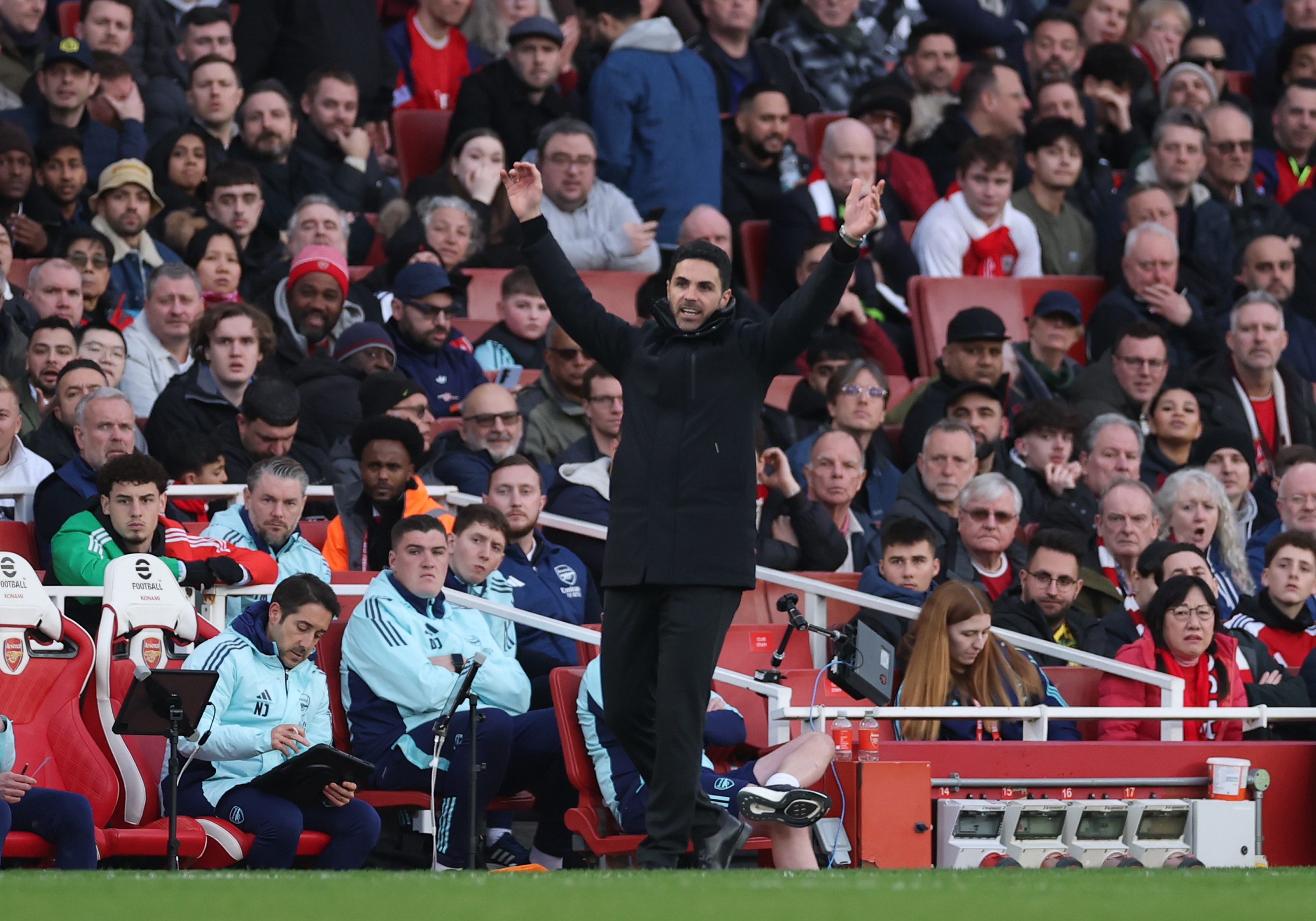 Mikel Arteta throws up his arms in frustration at the Emirates Stadium.