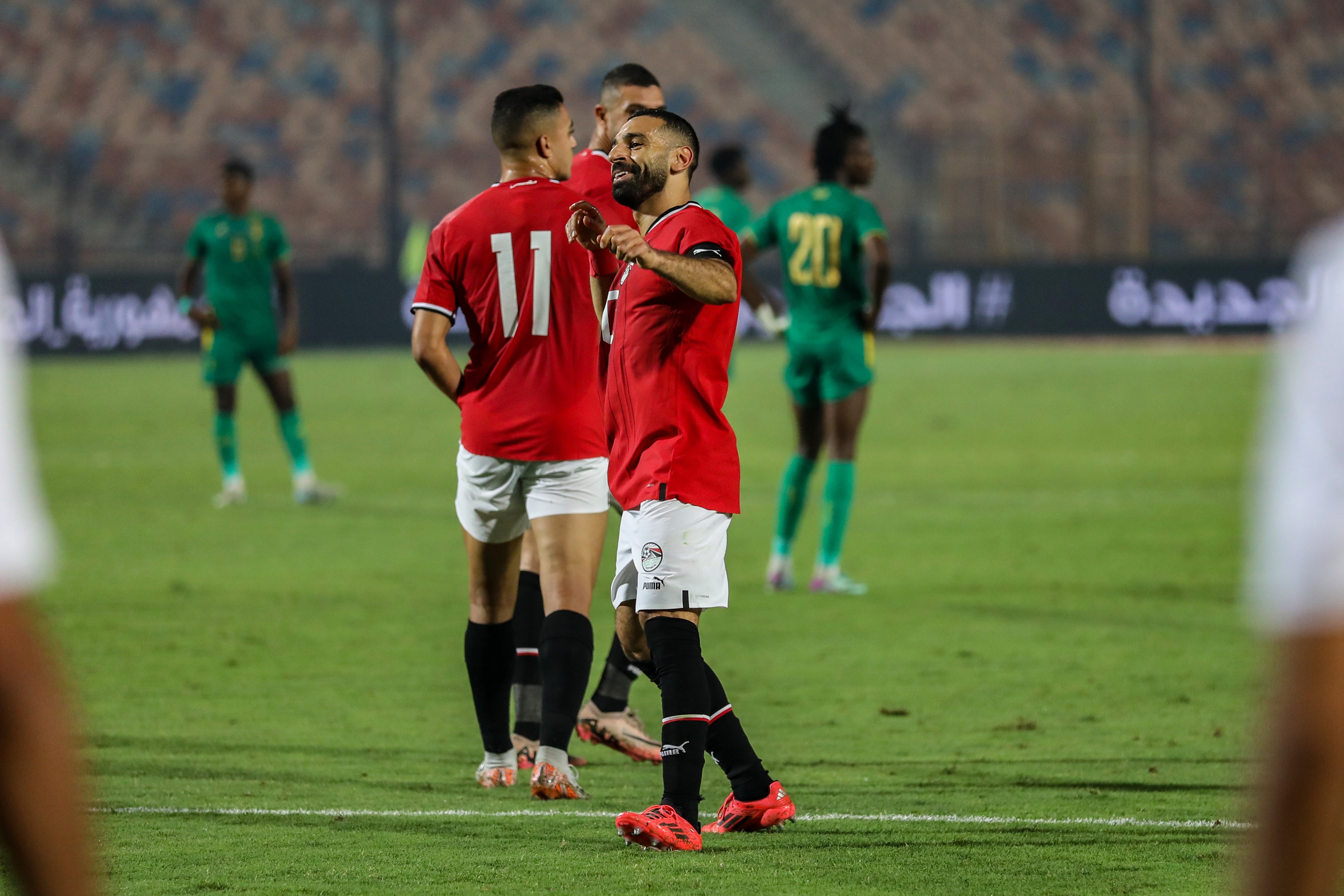 Mo Salah celebrates scoring a goal for Egypt.