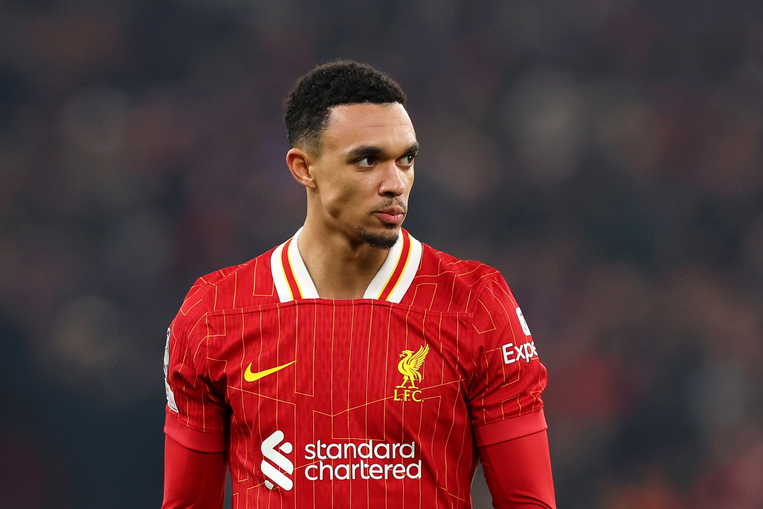 Trent Alexander-Arnold looks thoughtful during Liverpool game.