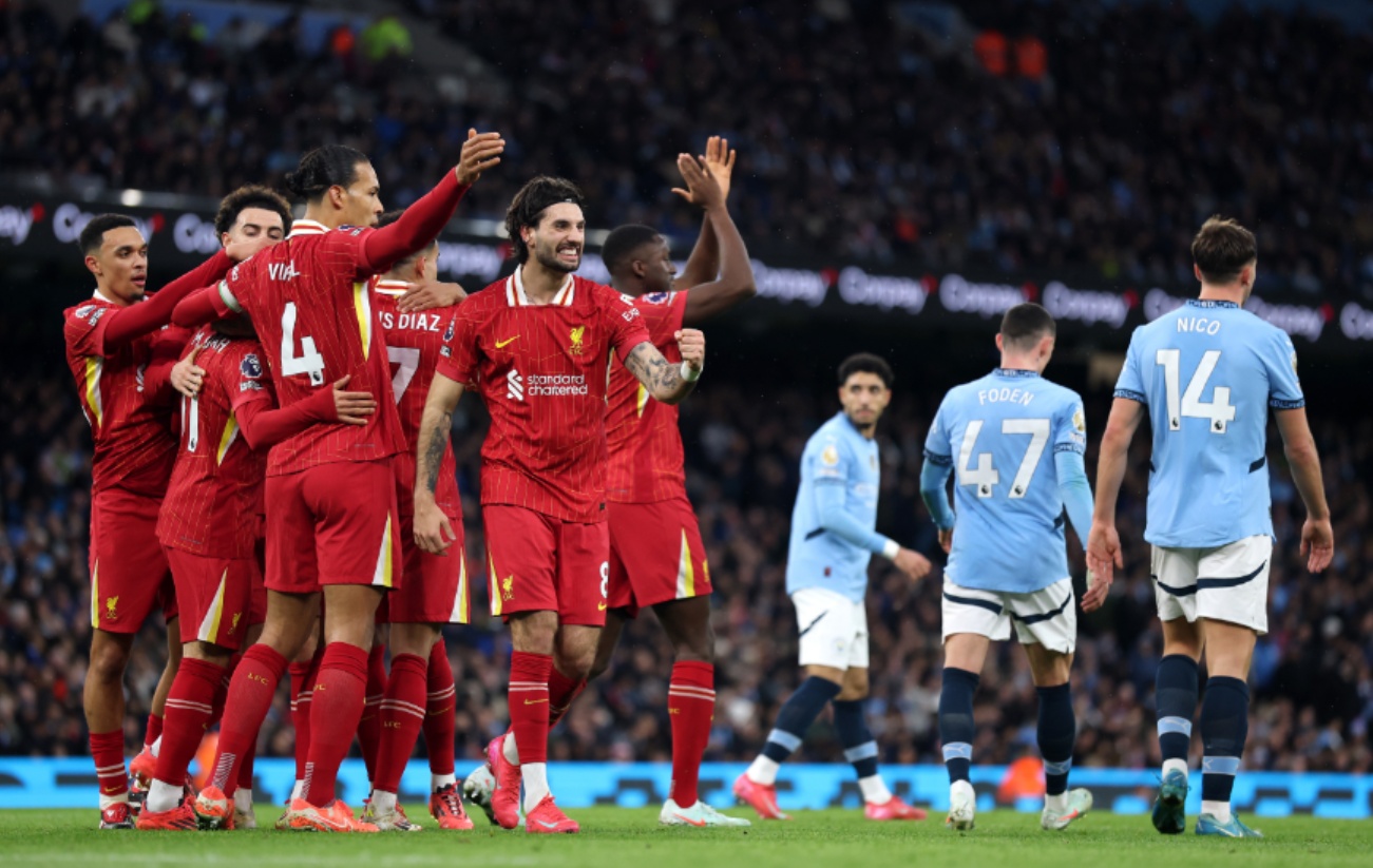 Liverpool players celebrate their win away to Manchester City