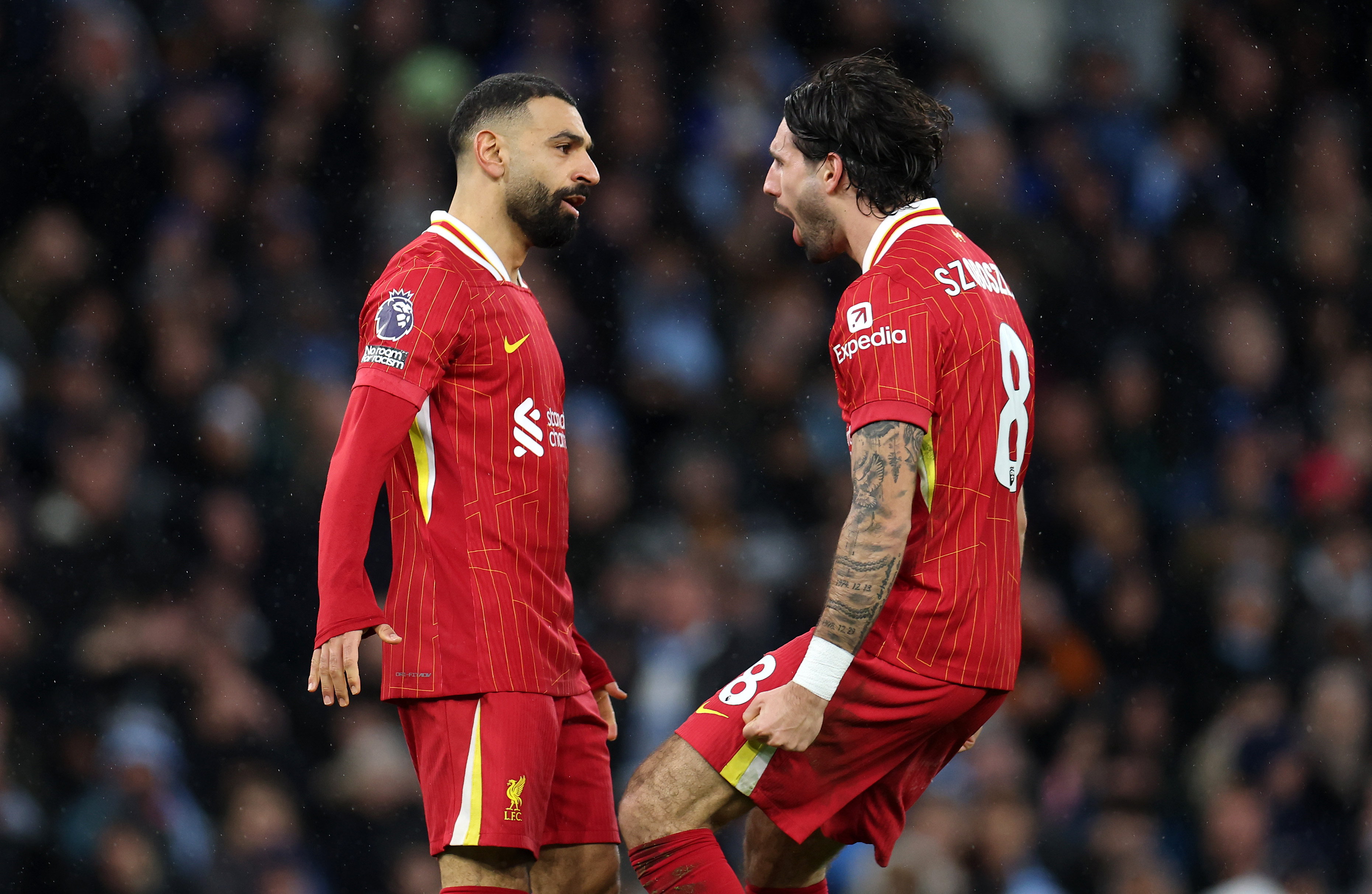 Mo Salah and Dominik Szoboszlai celebrate against Manchester City