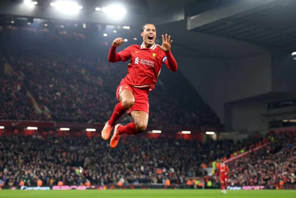 Virgil van Dijk celebrates scoring against Tottenham