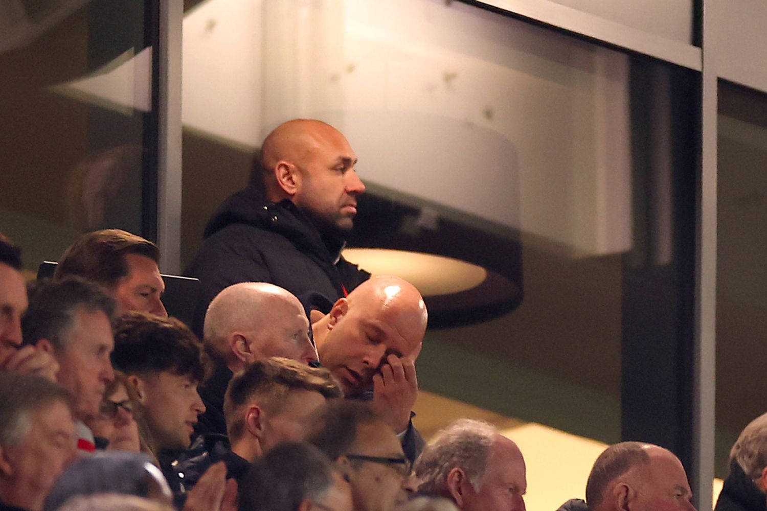 Arne Slot watches in anguish from the stands at Liverpool