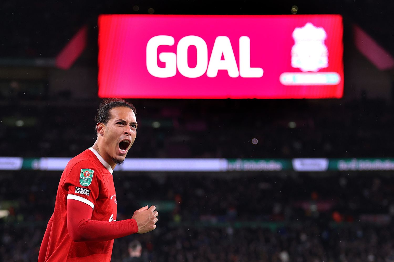 Virgil van Dijk celebrates scoring at Wembley