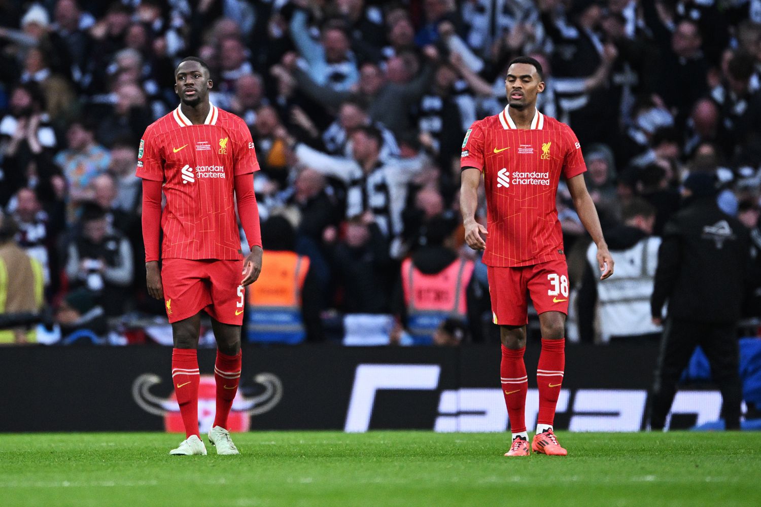 Liverpool plays look on as Newcastle celebrate